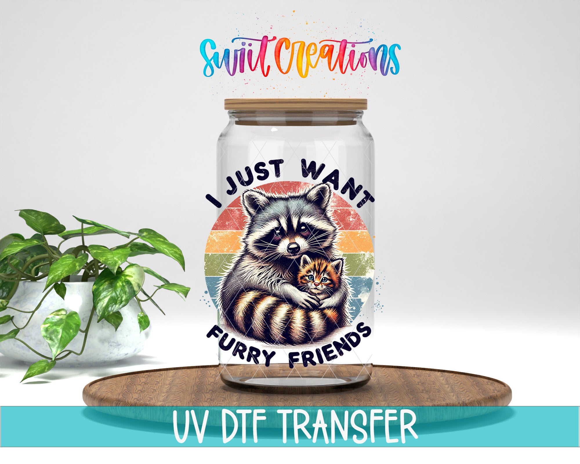 A jar with a raccoon and a kitten inside, along with the text "I JUST WANT FURRY FRIENDS" and a rainbow-colored design. The jar is placed on a wooden surface, and there is a potted plant in the background.