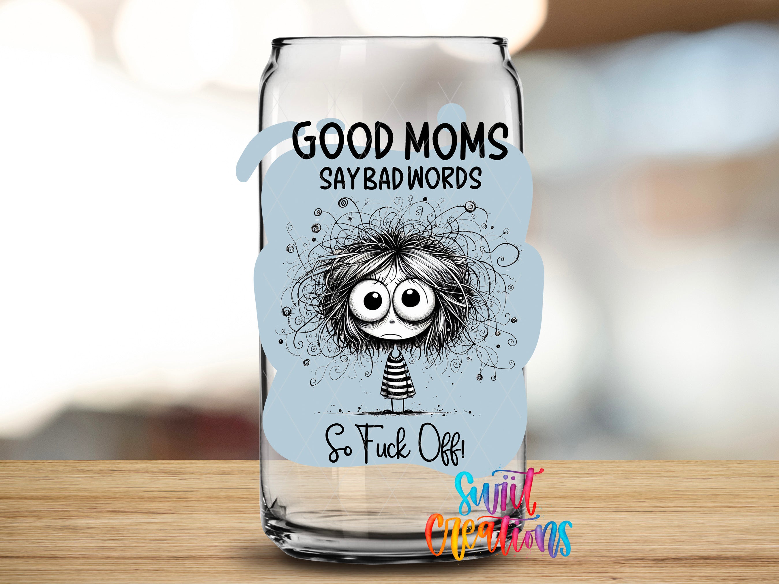 A glass can with a label that says "GOOD MOMS SAYBAD WORDS So FUCK OFF!"