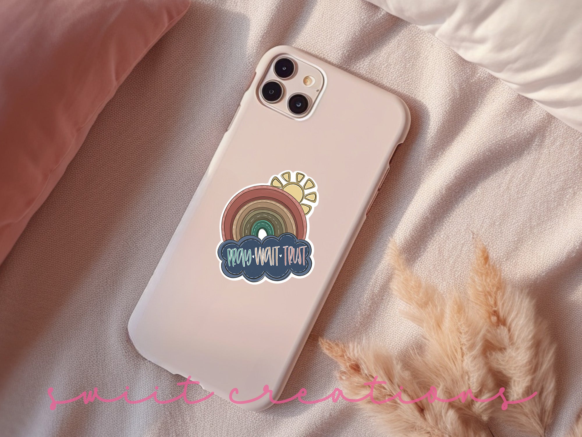 a phone case with a rainbow sticker on it