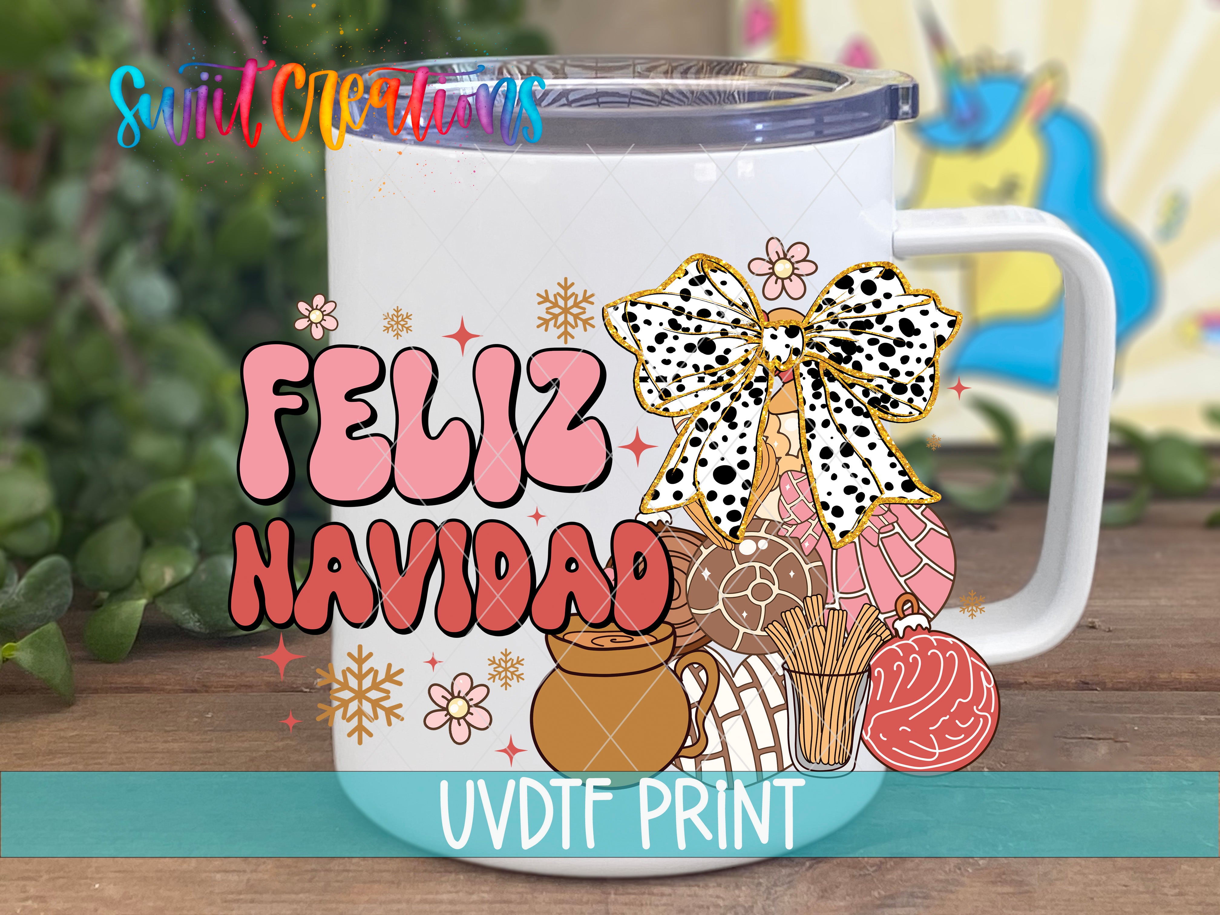 A white mug with a colorful design featuring a bow, flowers, and various objects, along with the text "Feliz Navidad" (Happy New Year) written on it.