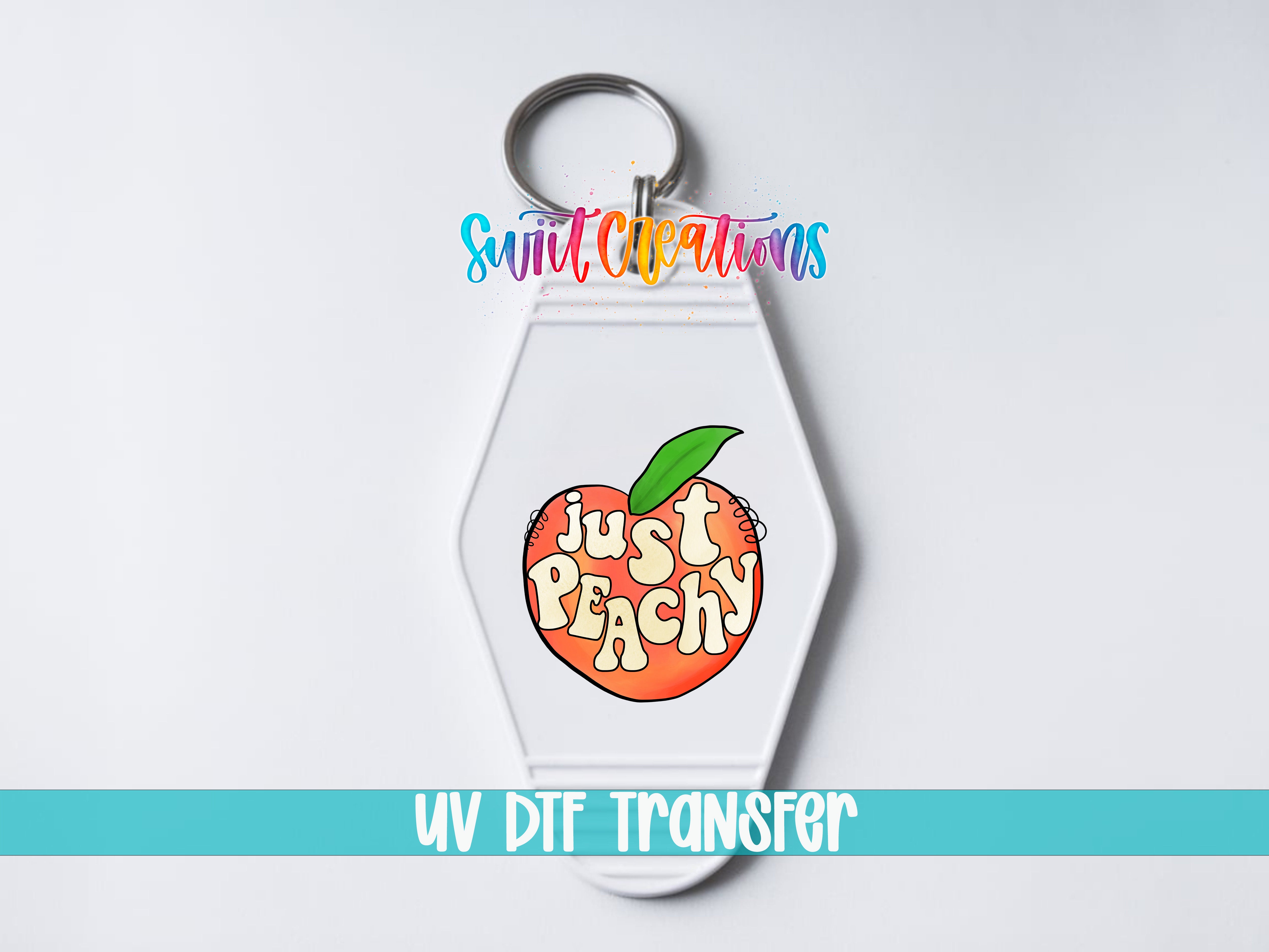 A keychain with a design featuring an orange peach and the text "Just Peachy" printed on it.