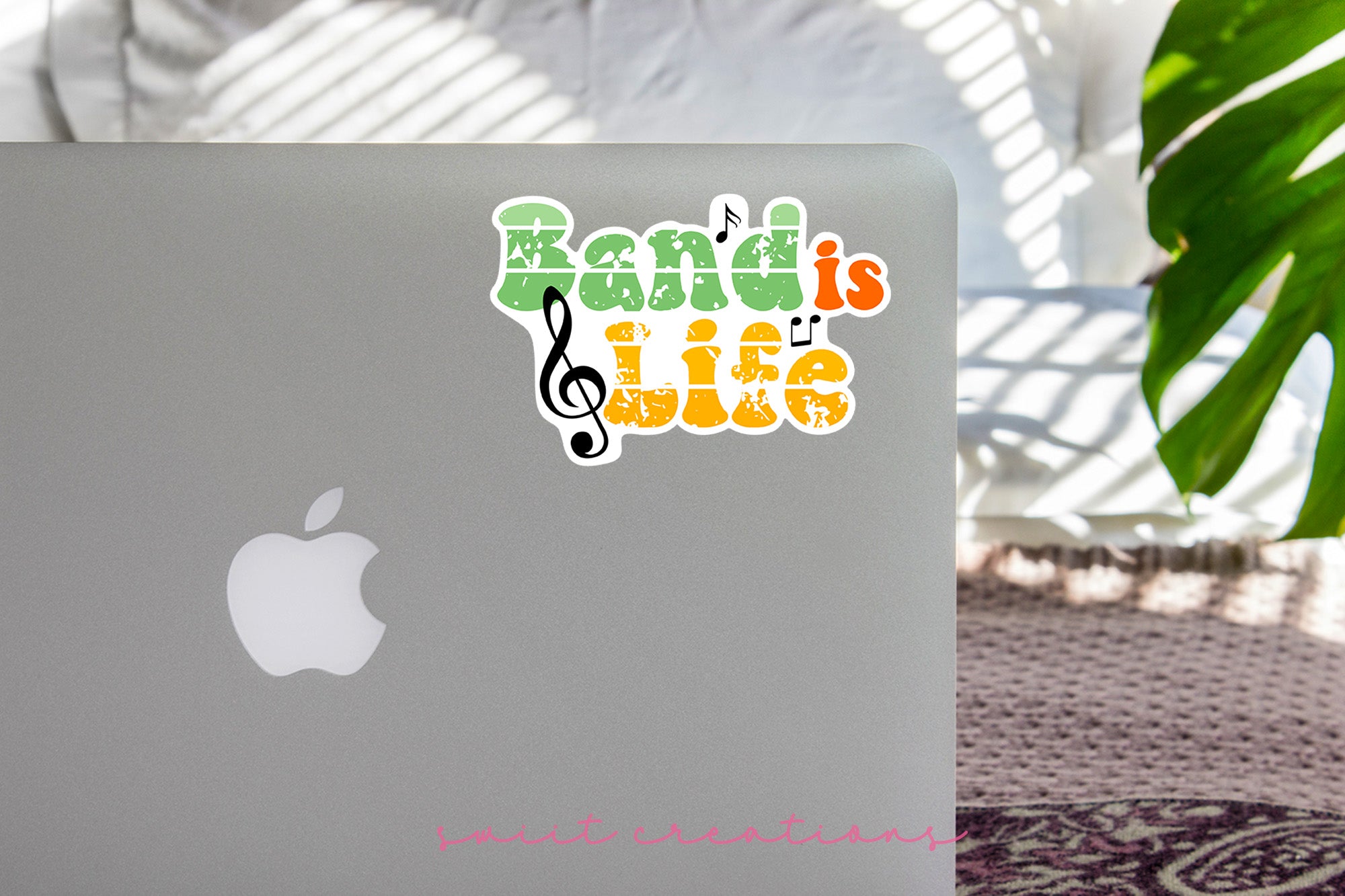 a laptop computer sitting on top of a table