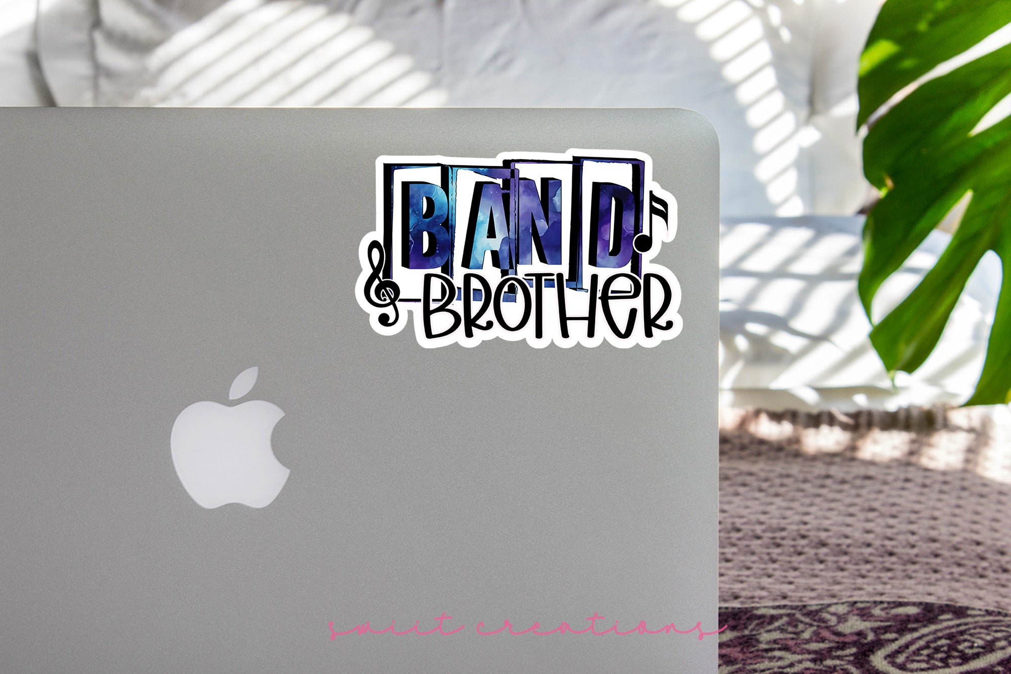 a laptop computer sitting on top of a table