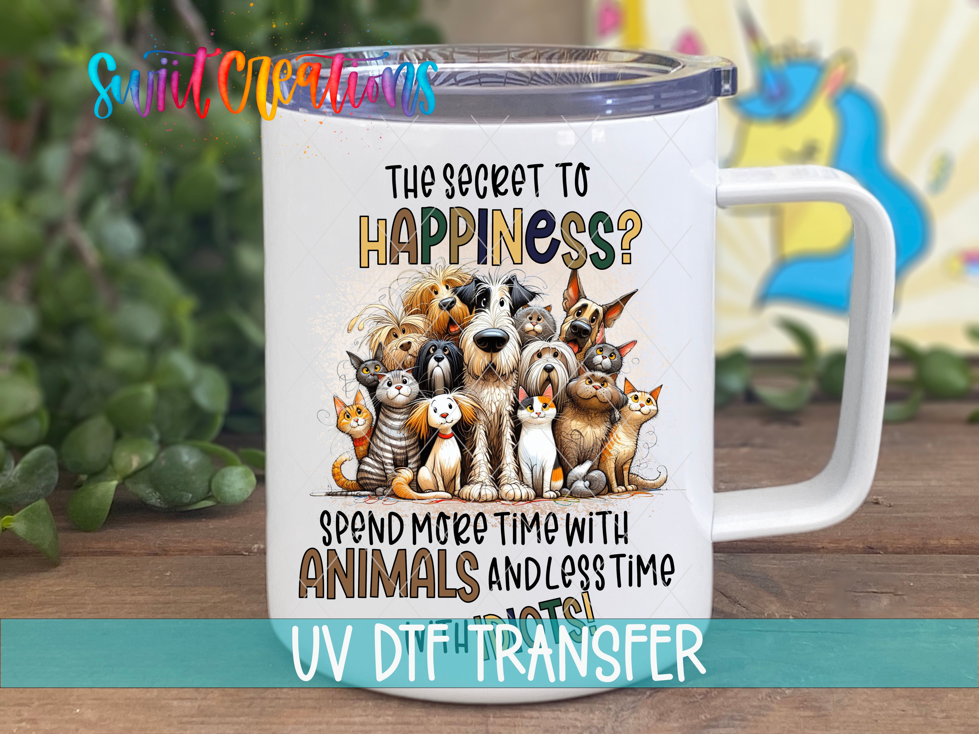 A white mug with a colorful illustration of various animals, including dogs, cats, and birds, along with text that reads "The secret to happiness? Spend more time with animals and less time on things".