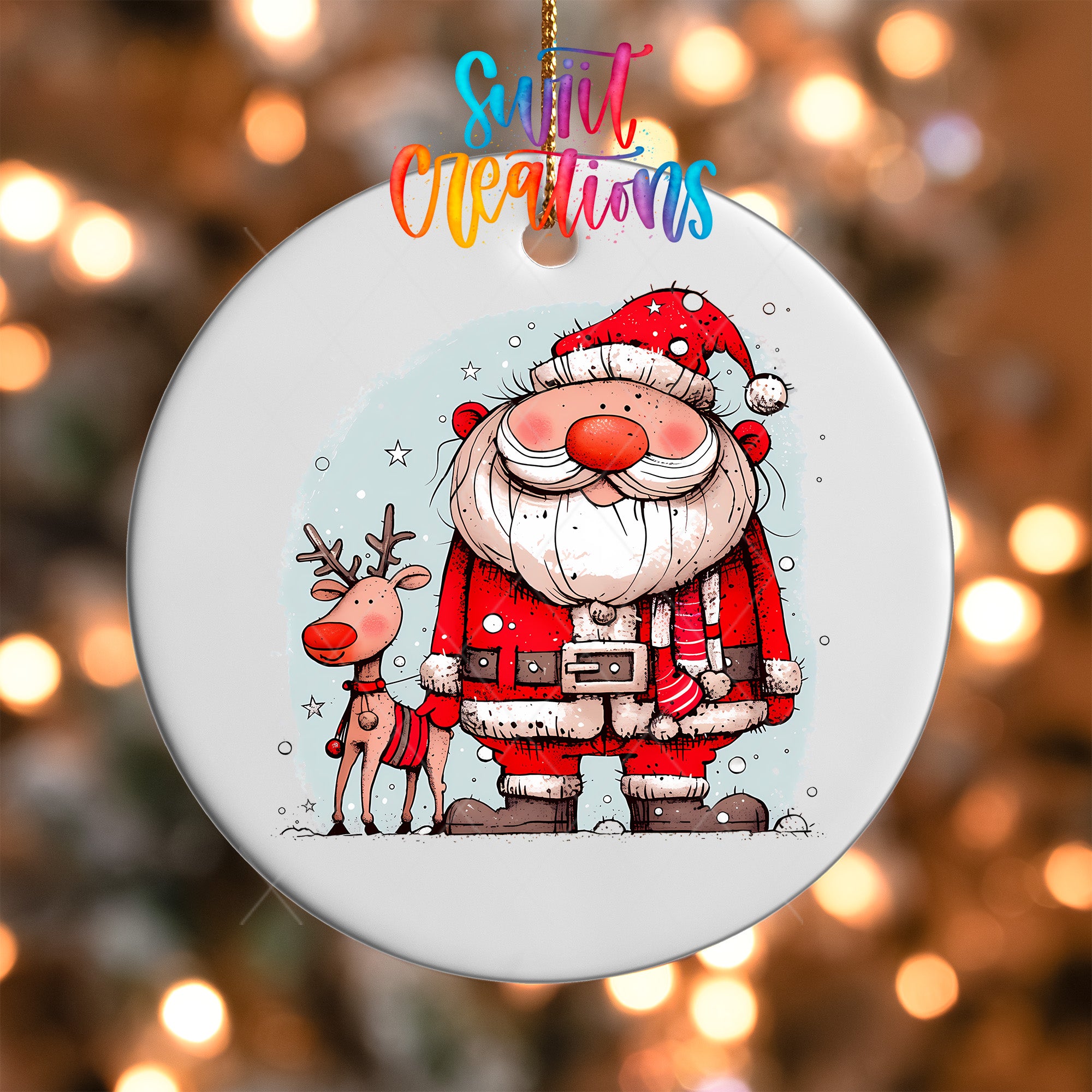 A white ornament featuring a cartoon illustration of Santa Claus and a reindeer, with the text "Sweet Creations" above the image.