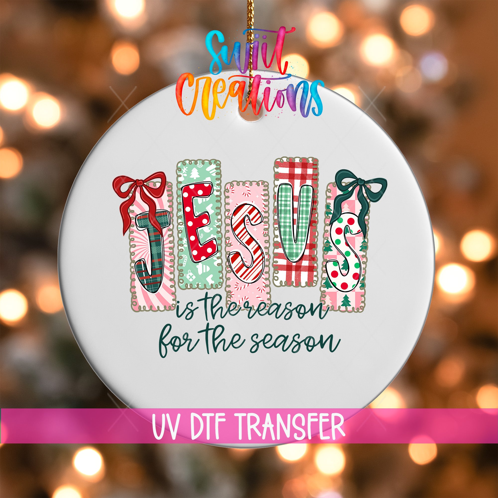 A decorative ornament with the word "JESUS" spelled out in colorful letters, surrounded by festive holiday-themed elements such as bows and snowflakes.