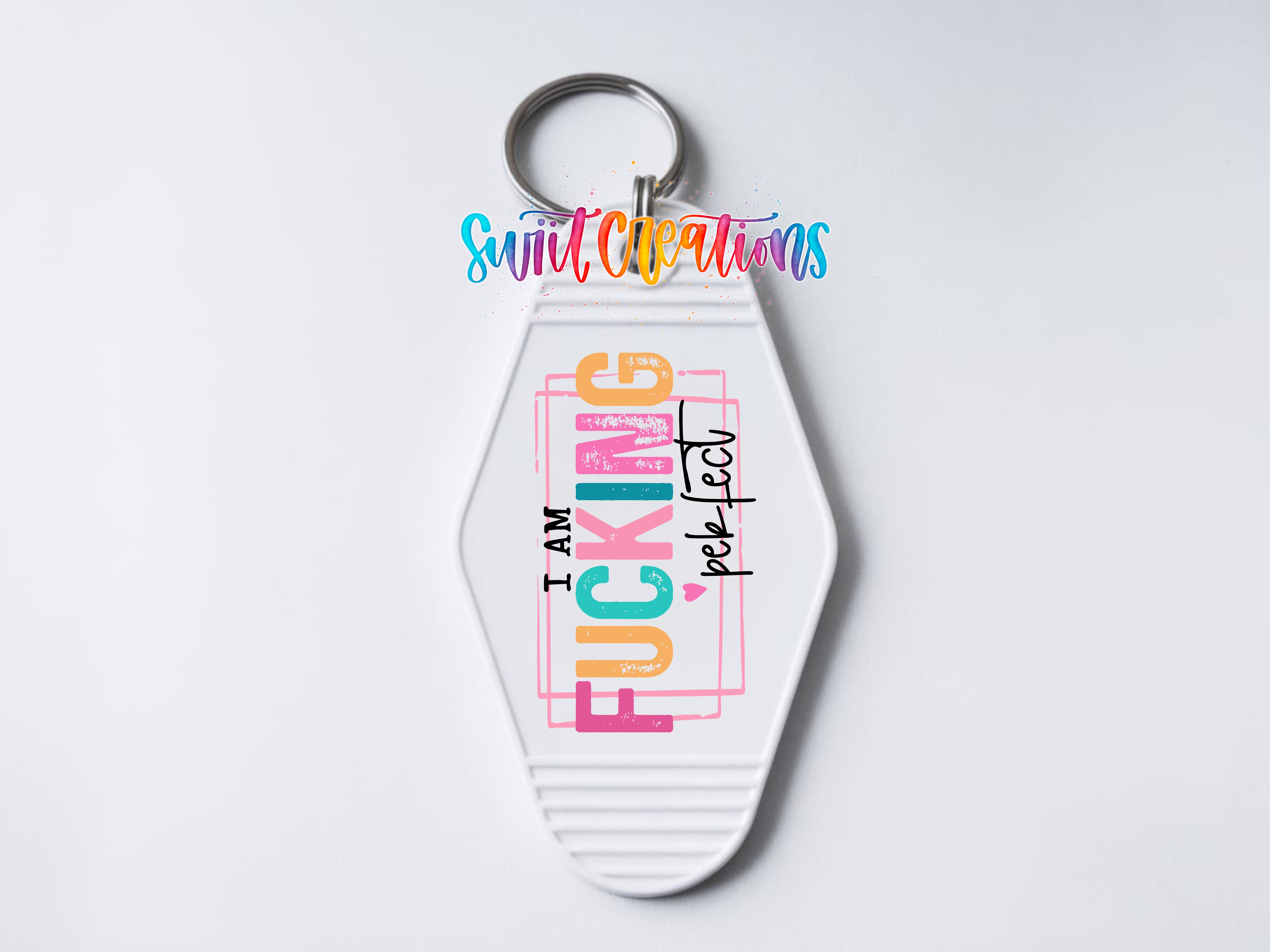 A keychain with a colorful design and text on it.
