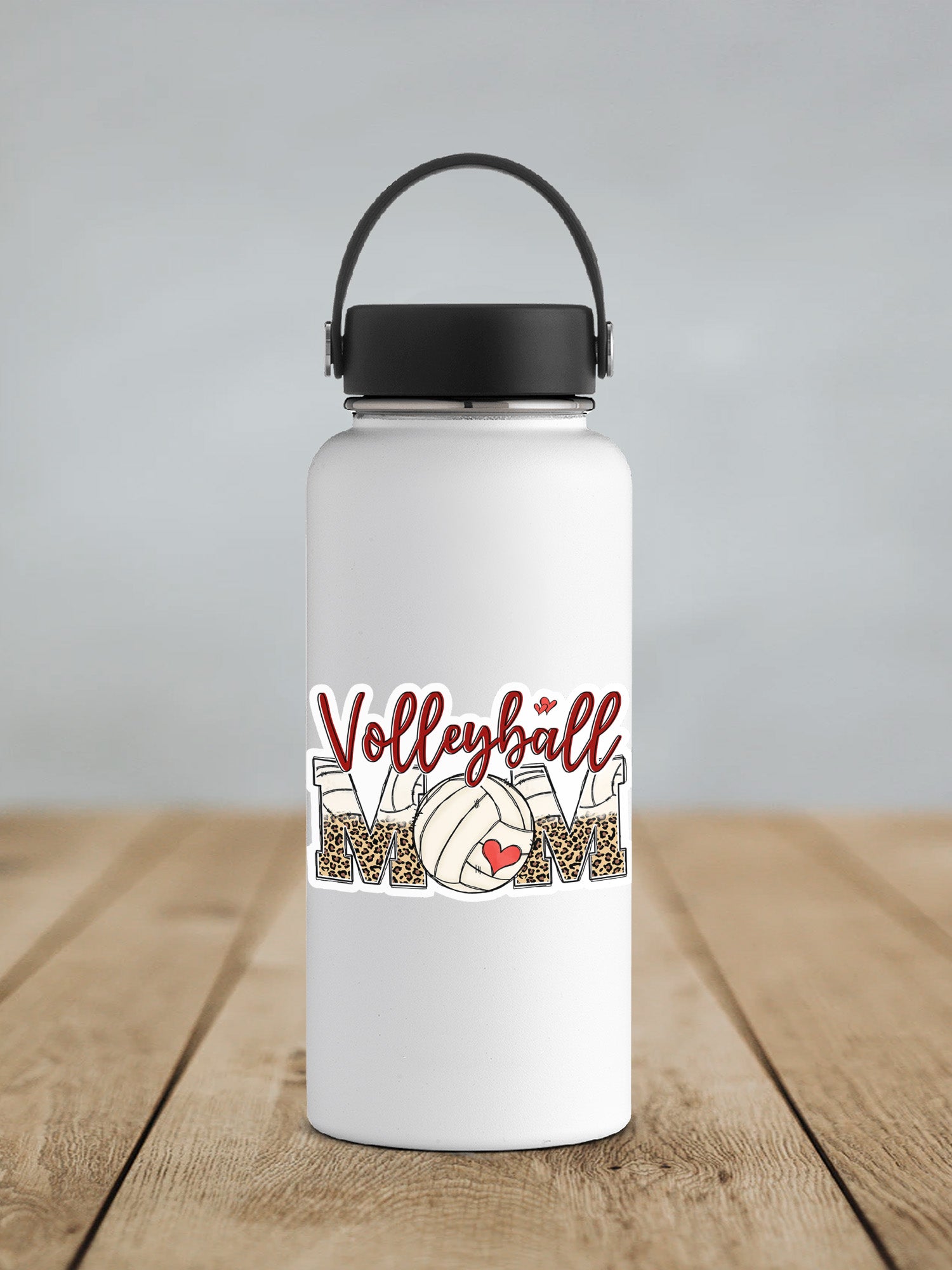 a white water bottle sitting on top of a wooden table