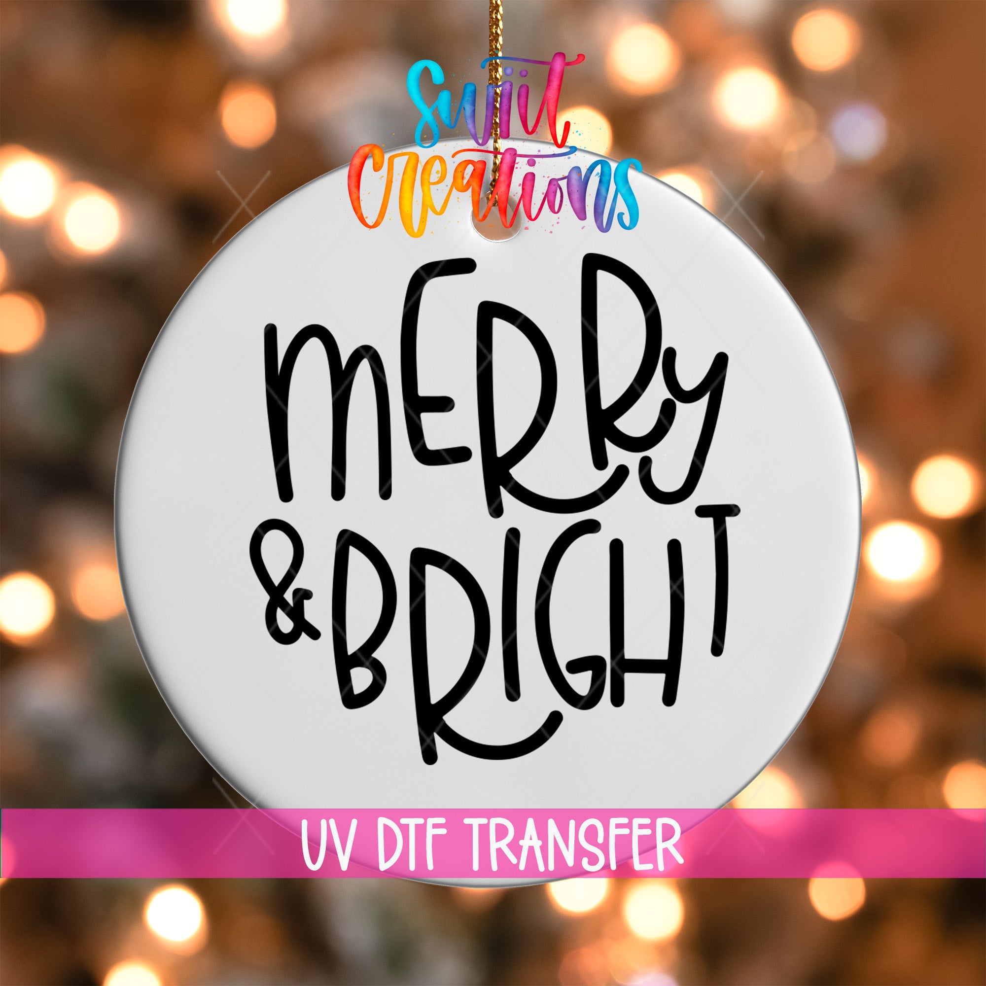 A white ornament with the text "MERRY & BRIGHT" written on it, hanging against a background of colorful lights.