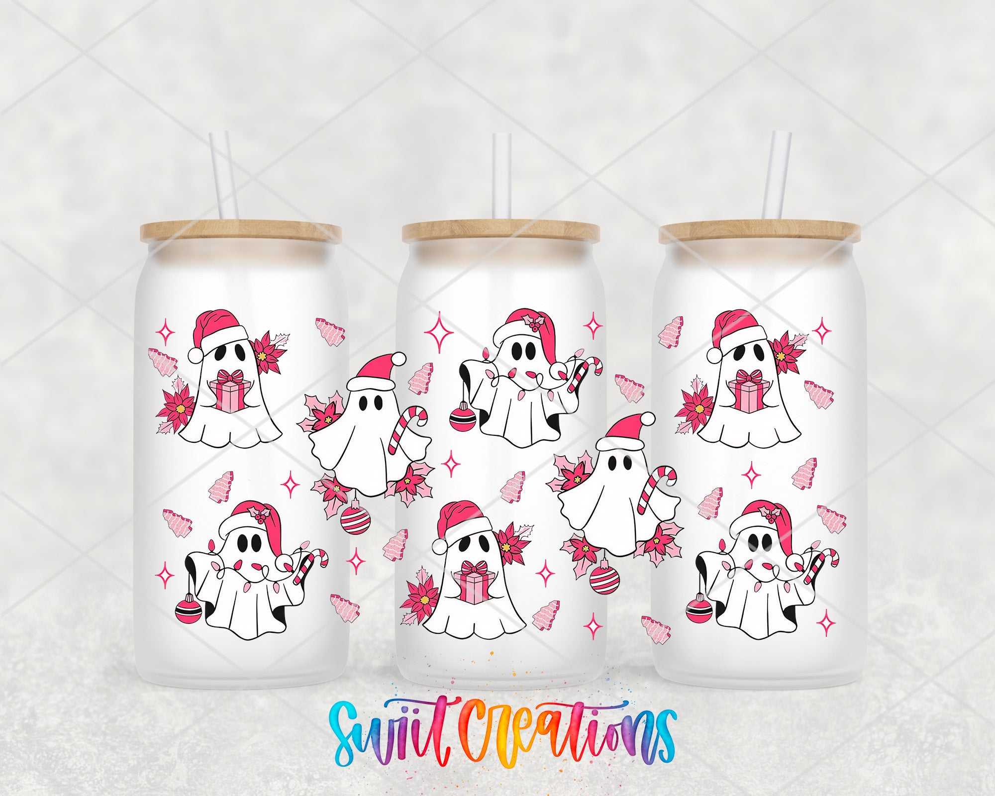 three white tumblers with pink and white ghost-like designs and straws.