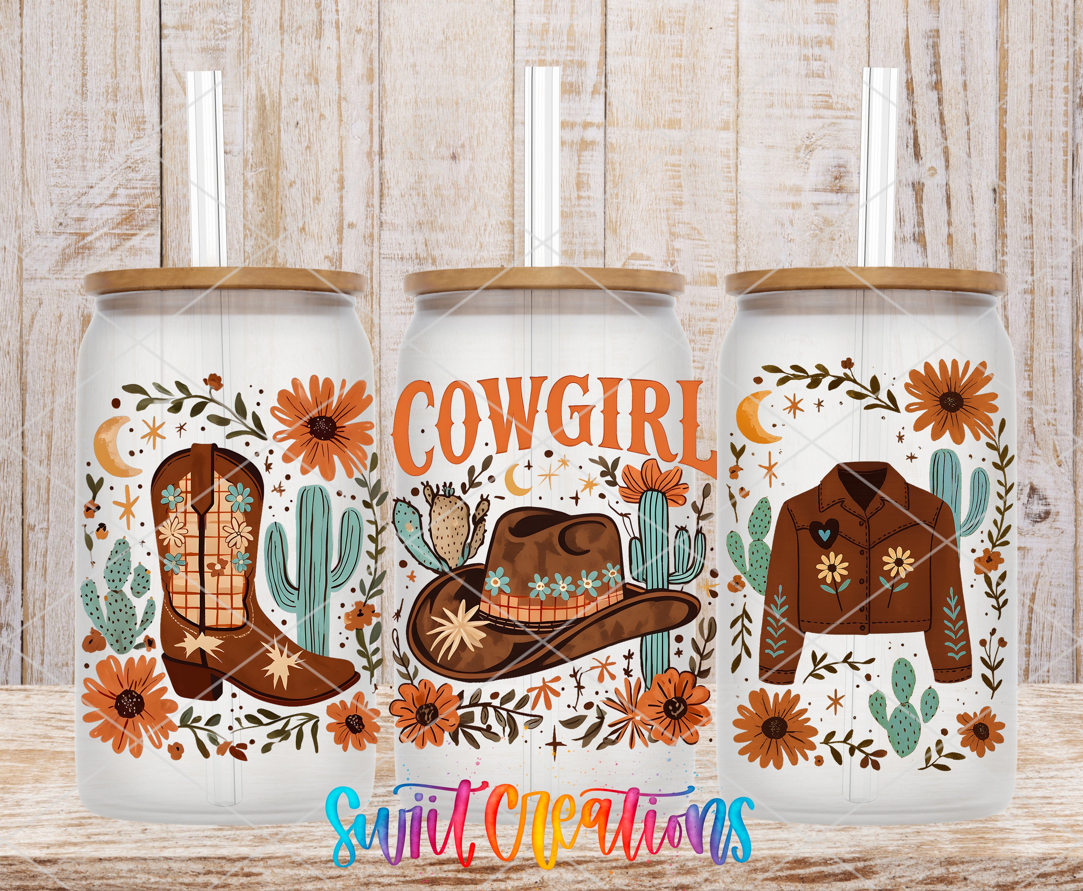 three glass tumblers with various cowboy-themed designs and text.