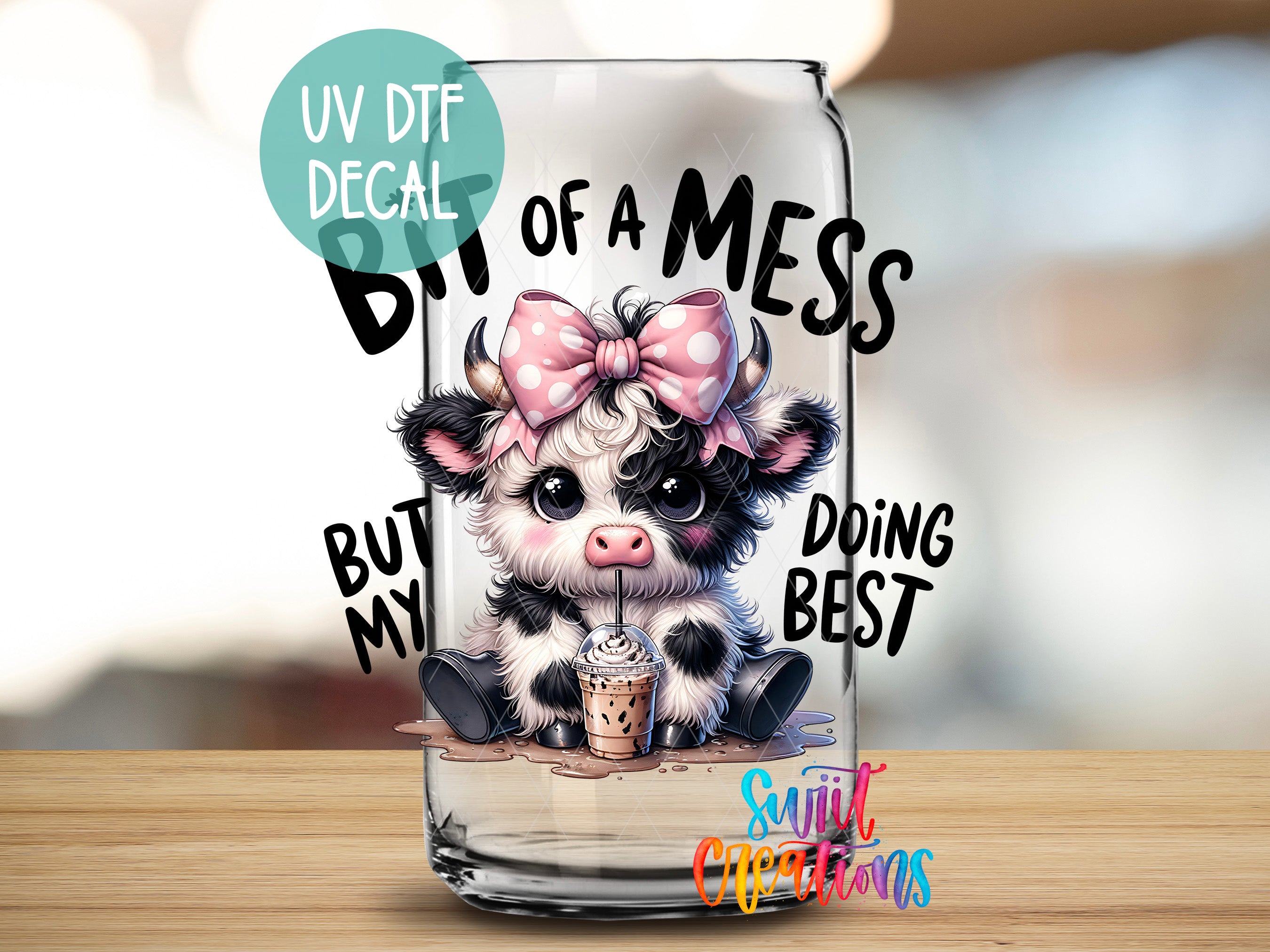 a glass with a picture of a little cow on it