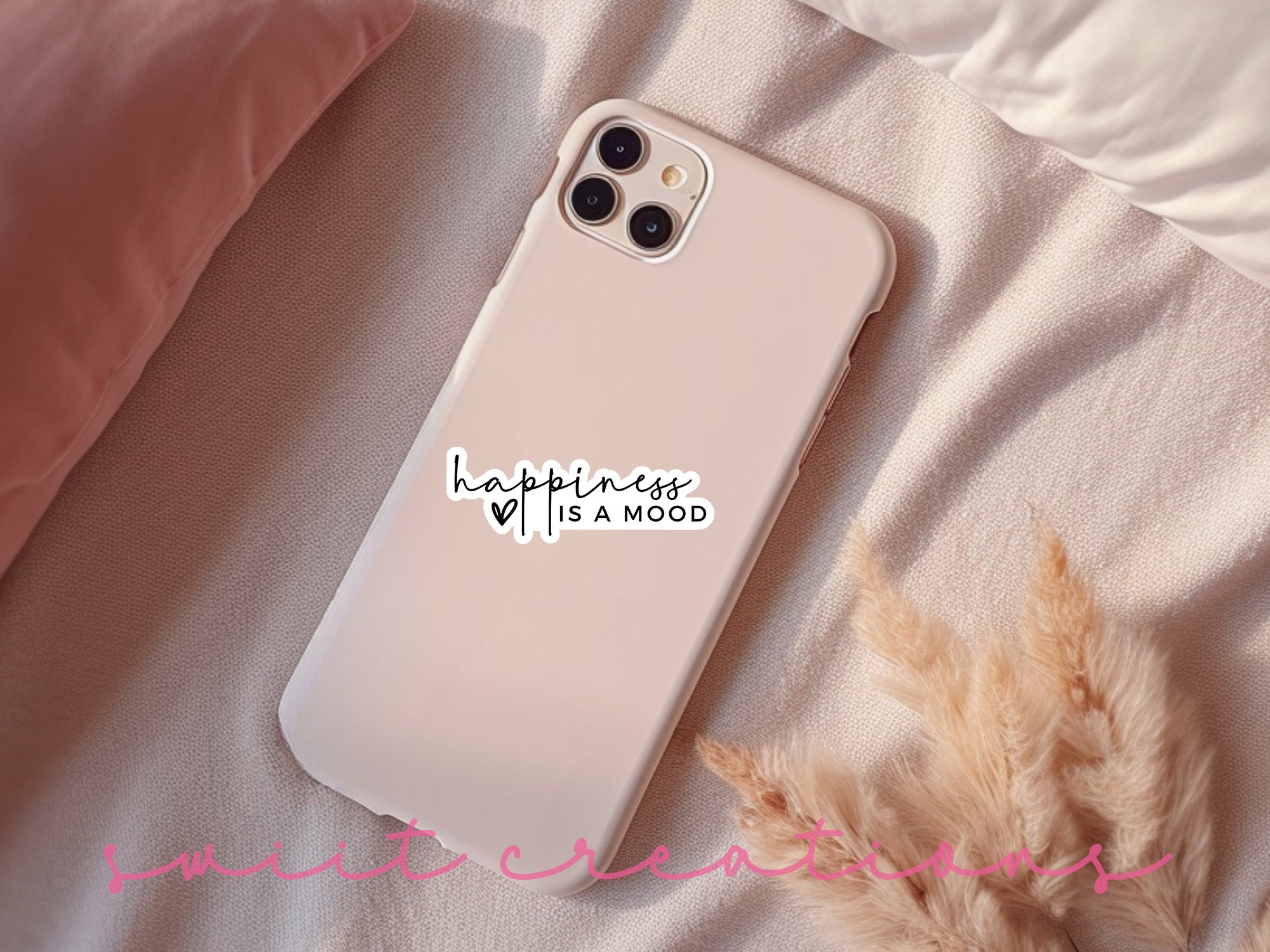 a white phone case with a sticker on it