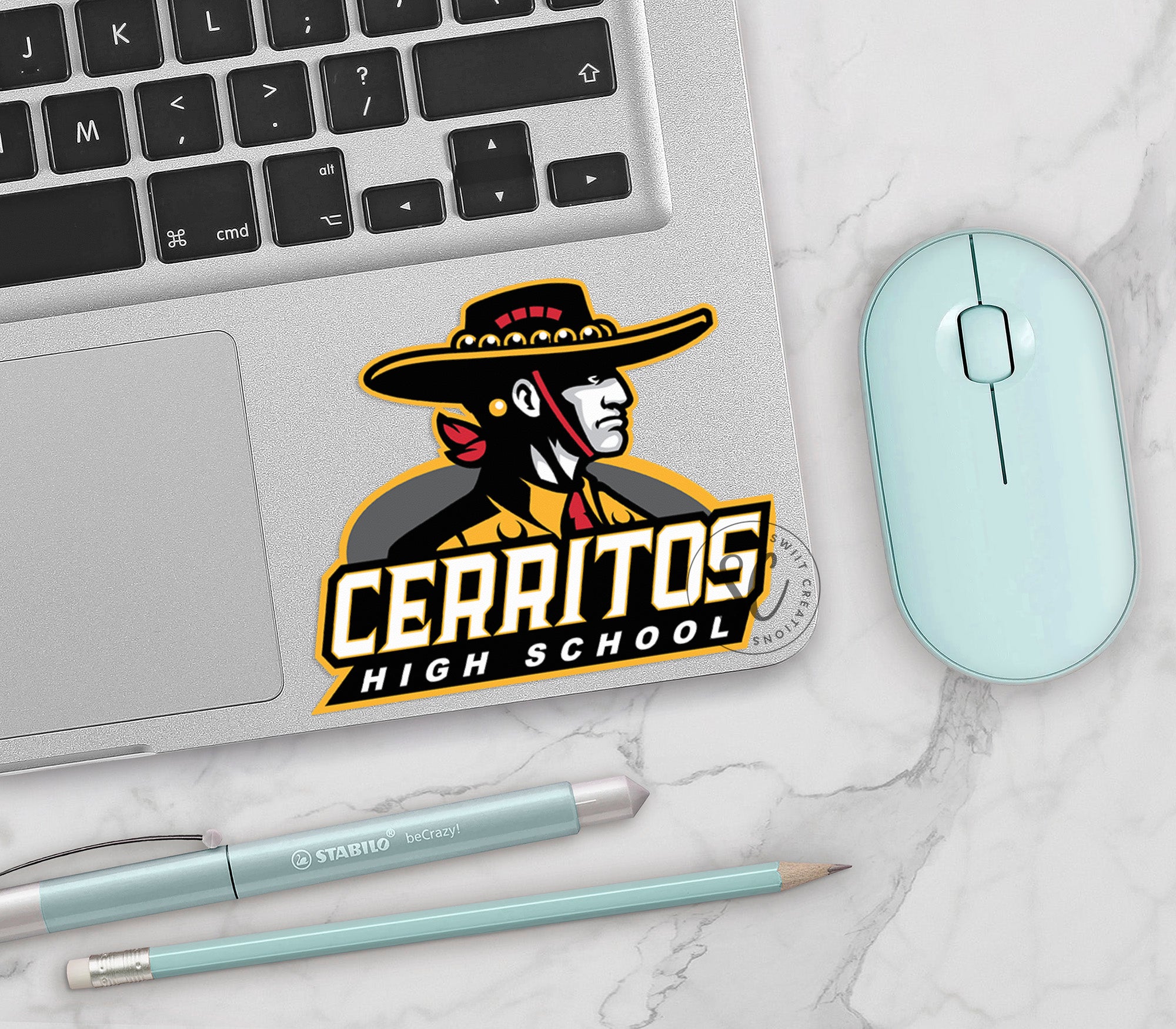 a mouse, keyboard, and mouse pad on a marble surface