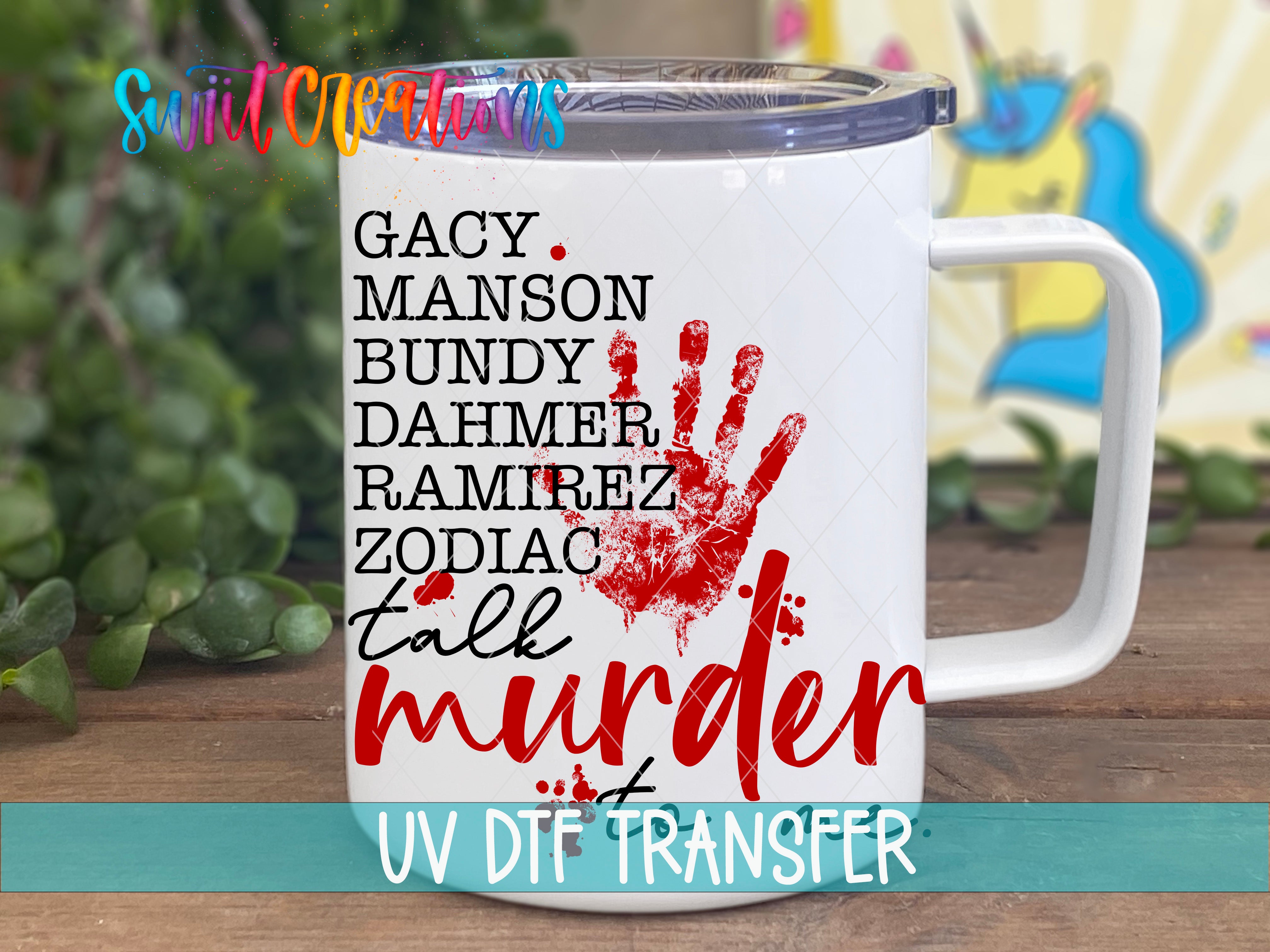 A white mug with a handprint design and text printed on it, placed on a wooden surface.