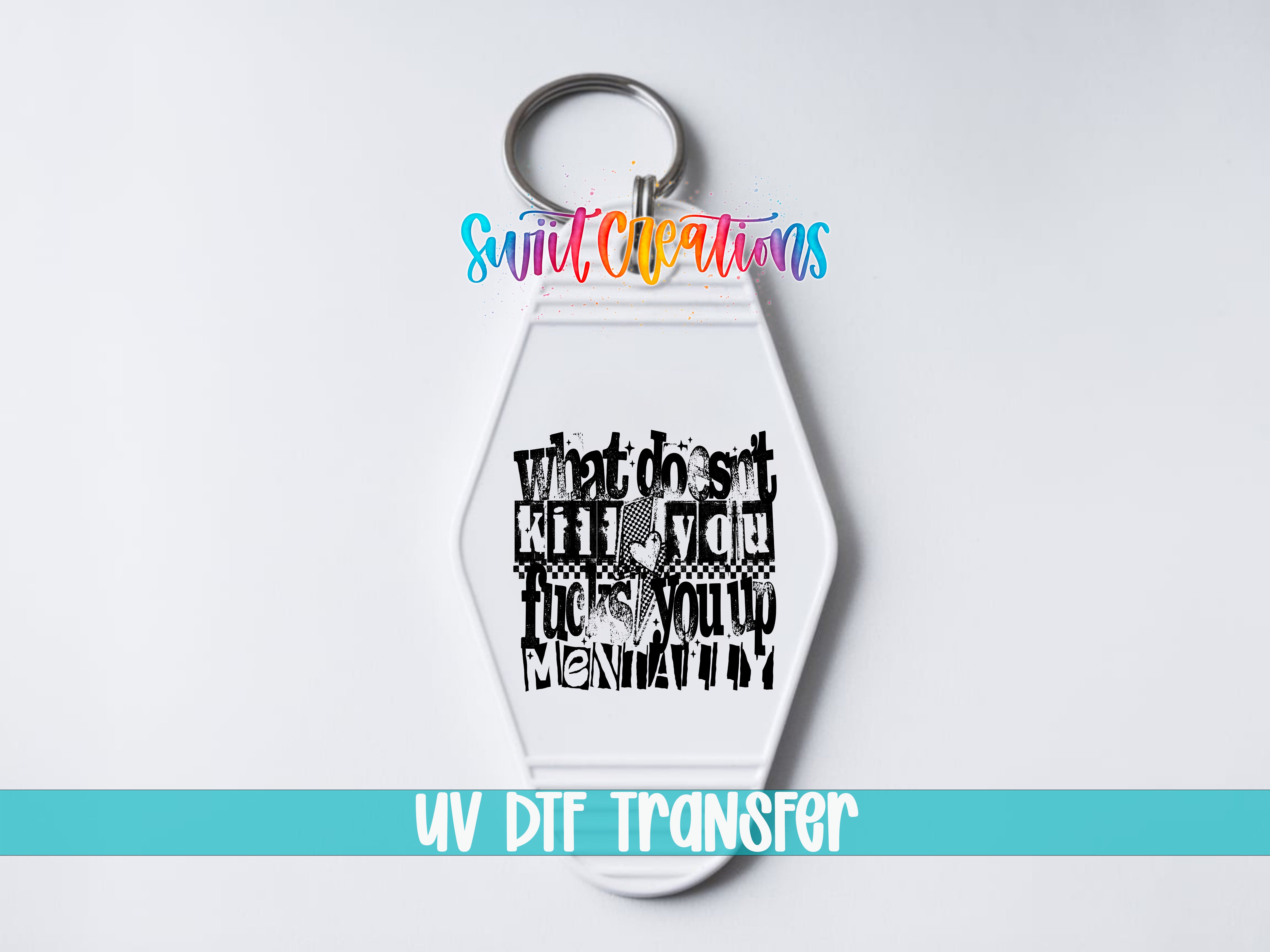 A keychain with a printed design on it, which appears to be a stylized text or graphic. The keychain is placed on a white surface, and there is a text overlay at the bottom of the image that says "UV DDF Transfer".