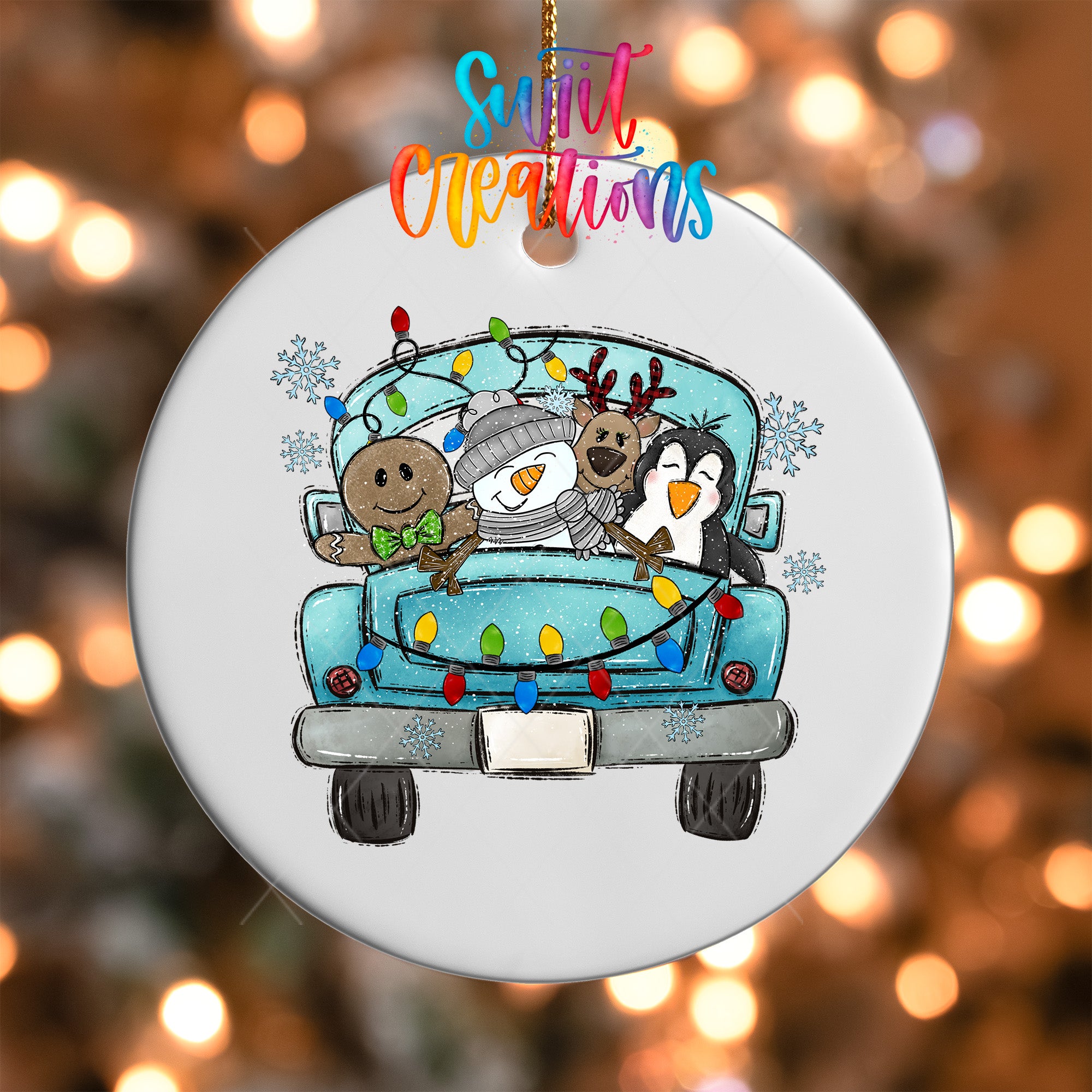 A white ornament with a cartoon illustration of a truck decorated with Christmas lights and various holiday-themed characters, including a snowman, reindeer, and penguin.