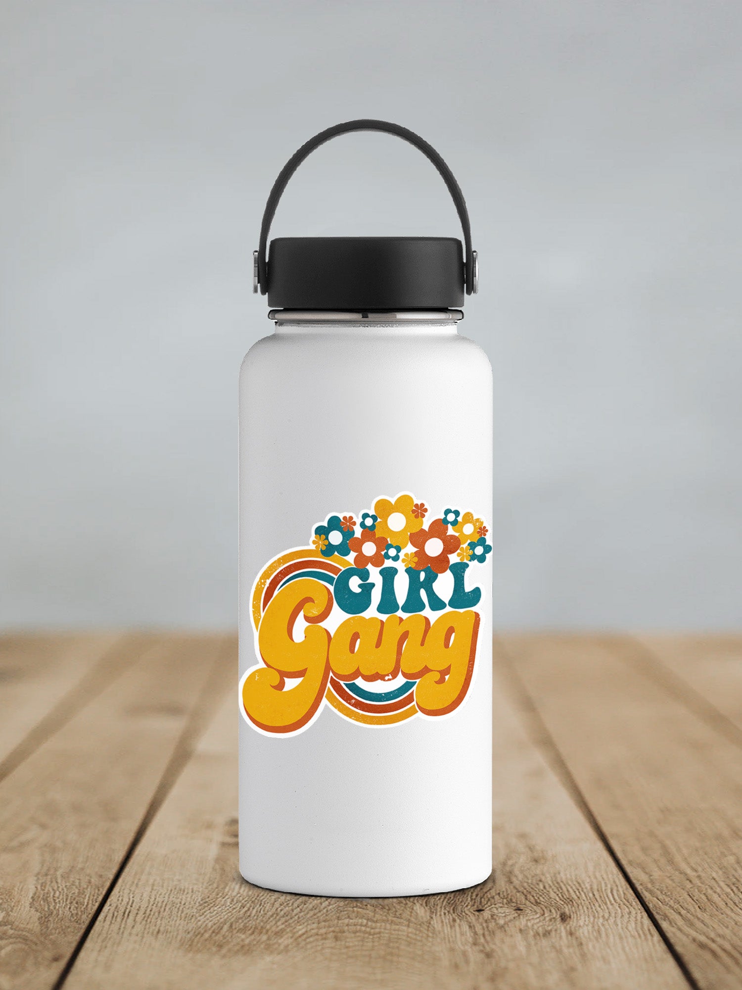 a white water bottle sitting on top of a wooden table