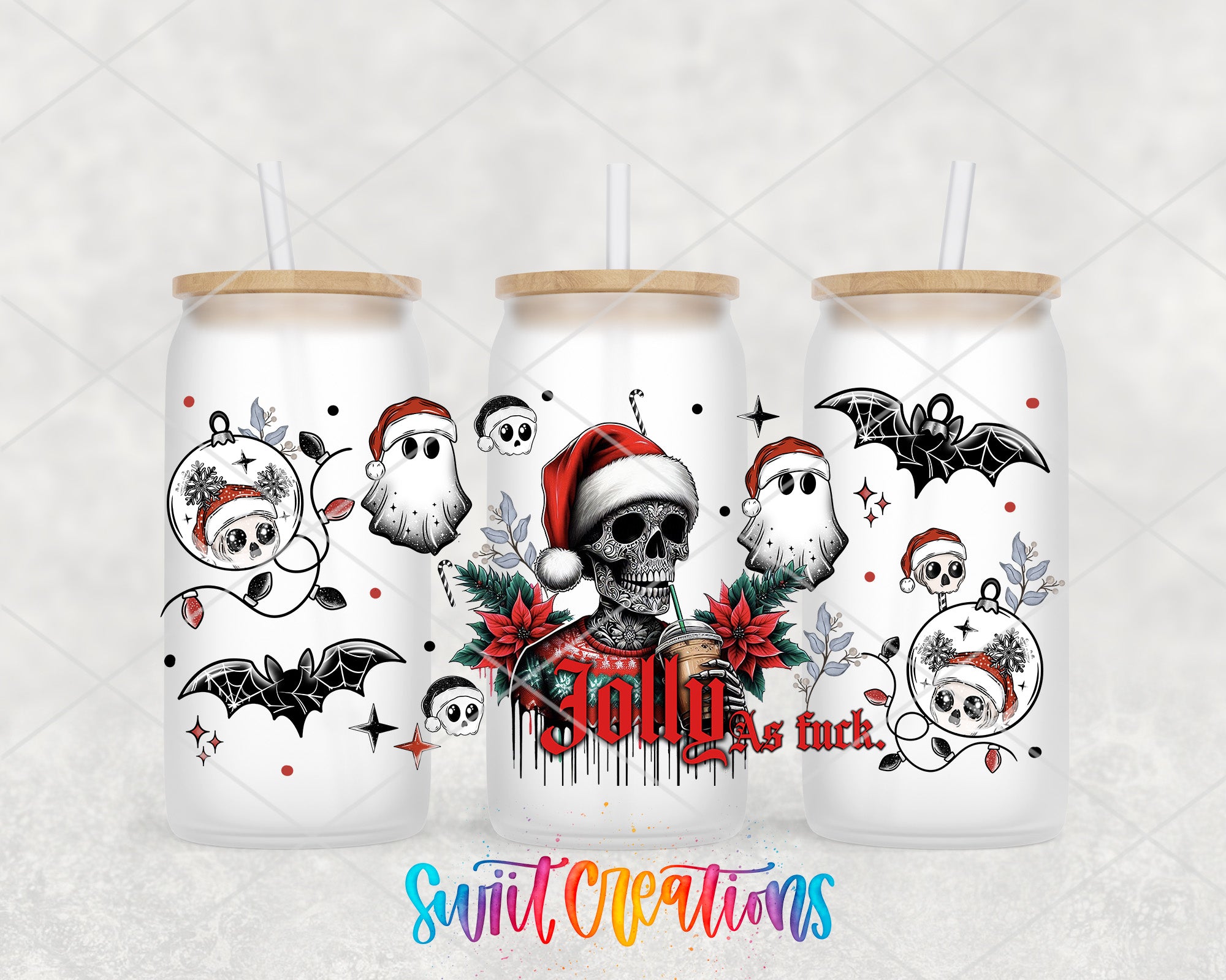 A trio of white tumblers with black and red designs, including skull motifs, bats, and Christmas ornaments.