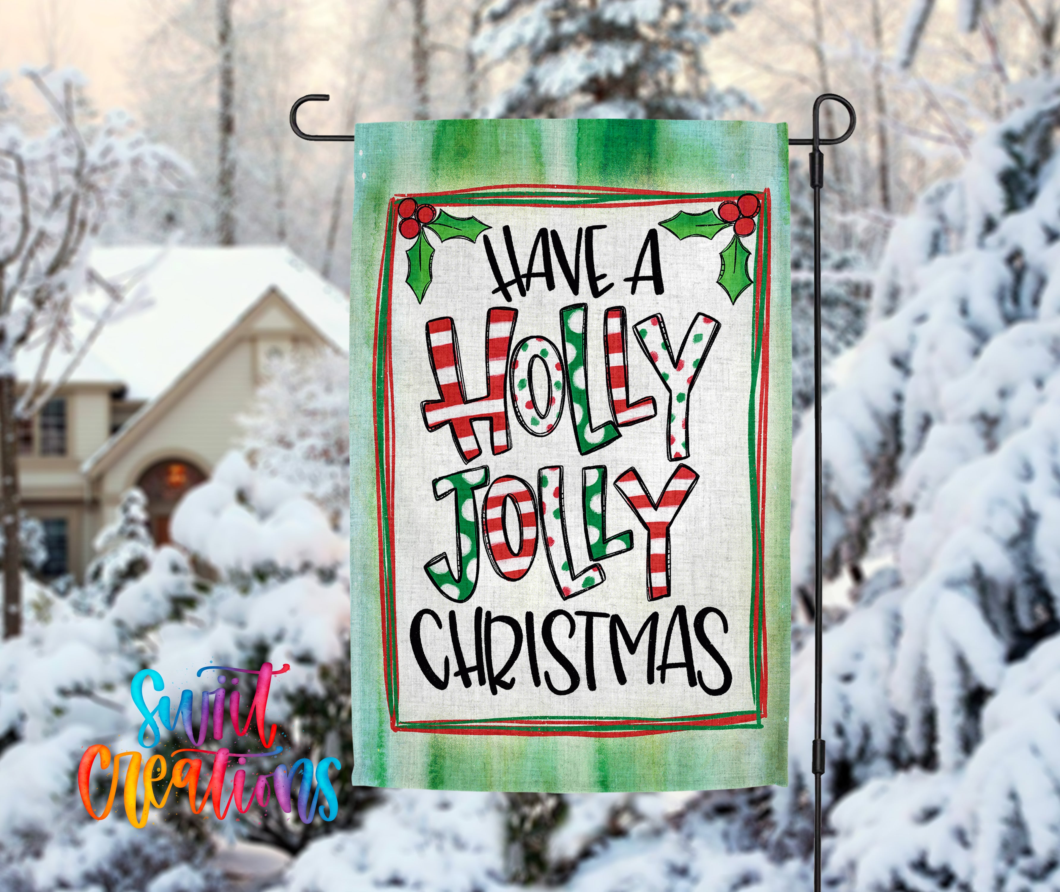 A green flag with the text "Have a Holly Jolly Christmas" displayed on it, hanging in front of a snowy landscape with a house and trees in the background.