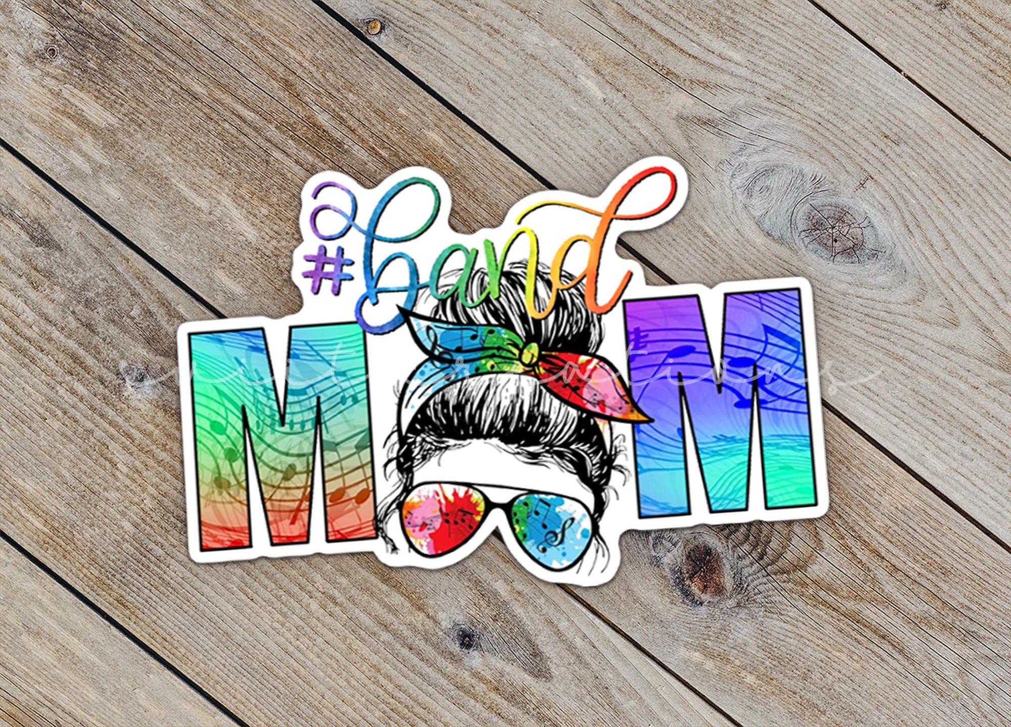 a sticker with the word mom painted on it