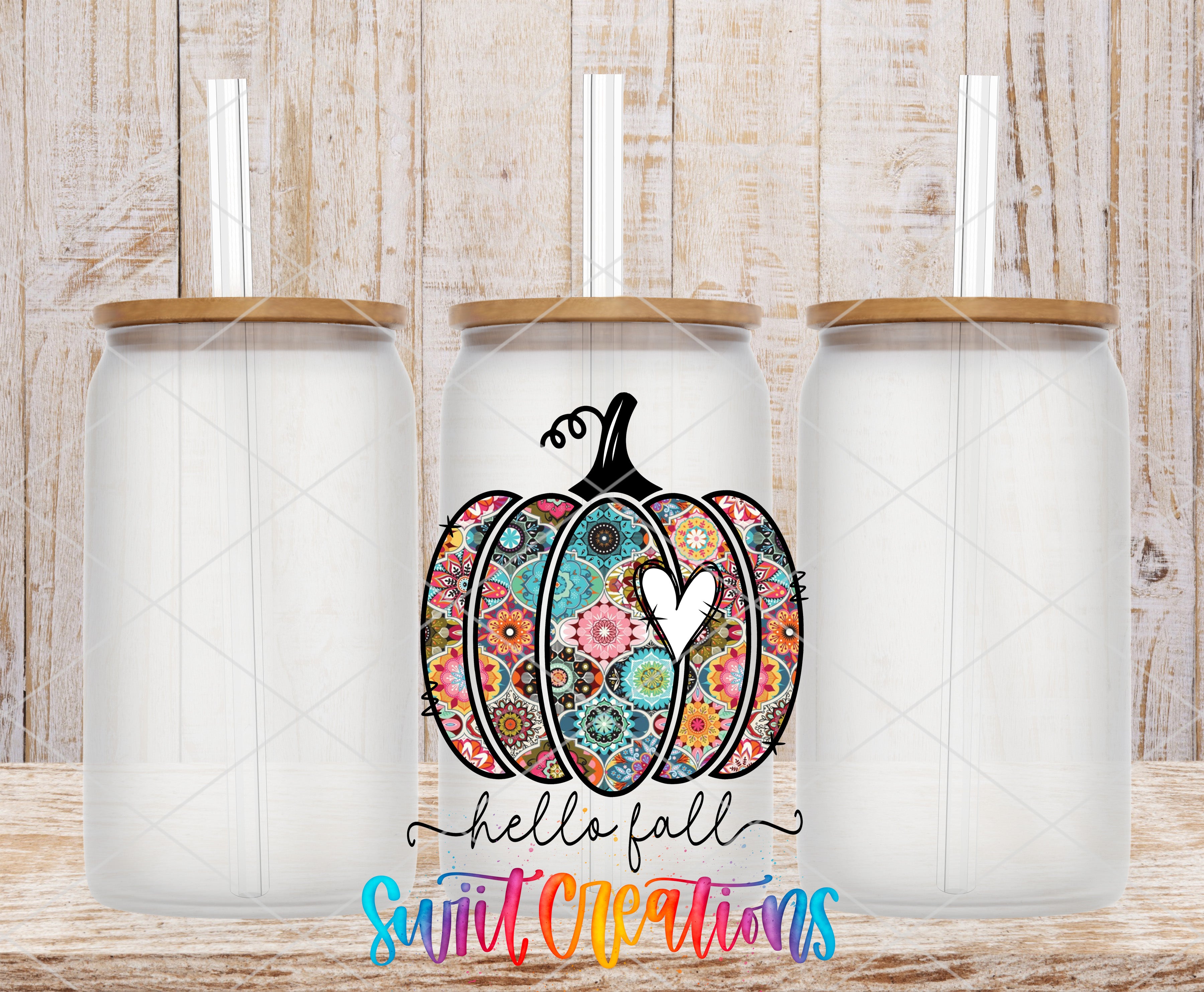 three glass jars with lids, each containing a straw, and a colorful pumpkin design in the center. The pumpkin design has a heart and the text "Hello fall" written on it.