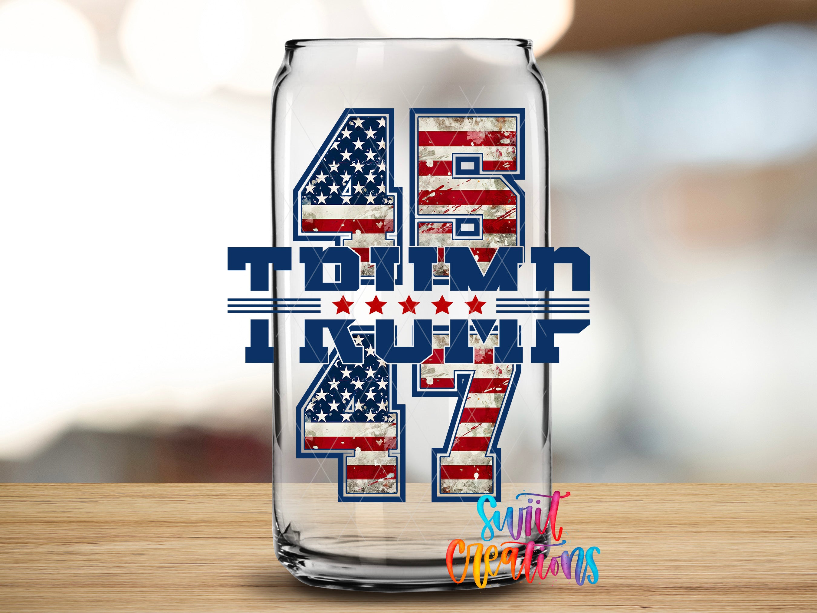 A glass can with the text "48 TOWN 47" and "Trump 47" printed on it, along with an American flag design.