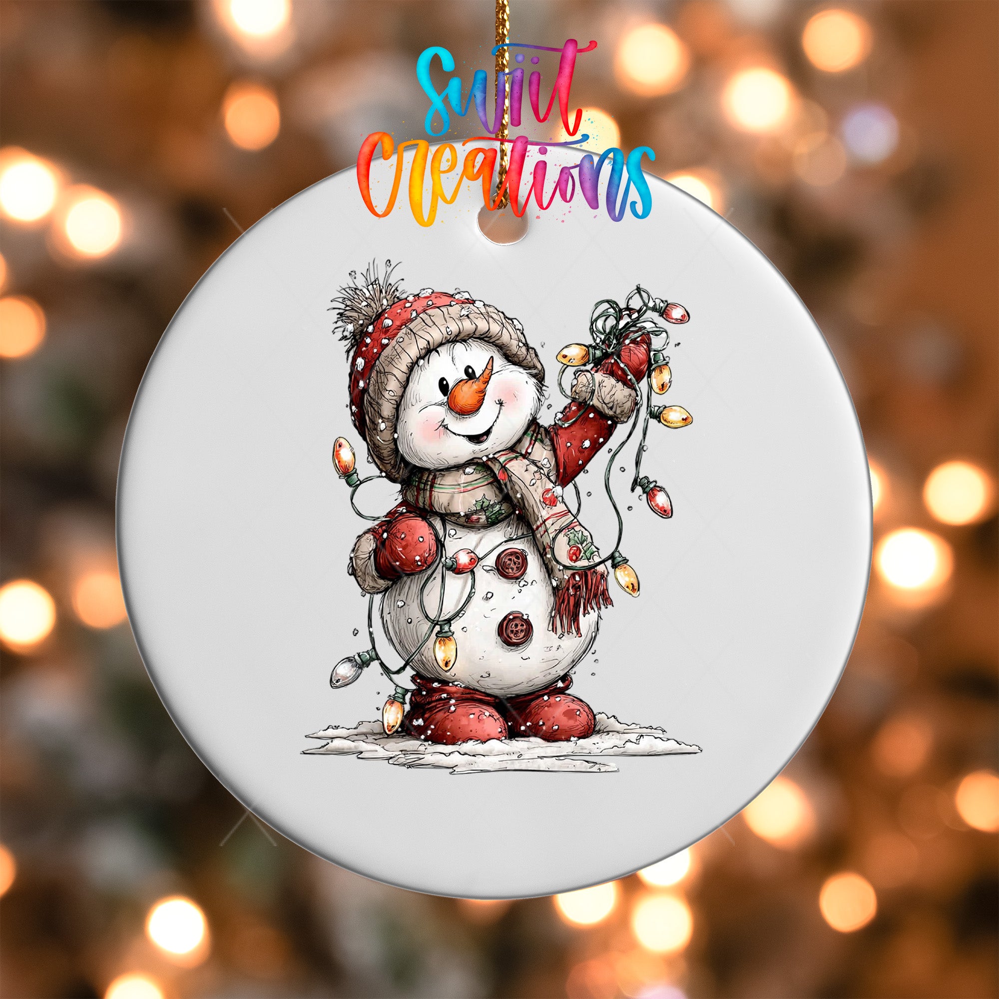 A snowman ornament with a string of lights, wearing a red hat and scarf, and holding a red scarf in its hand.