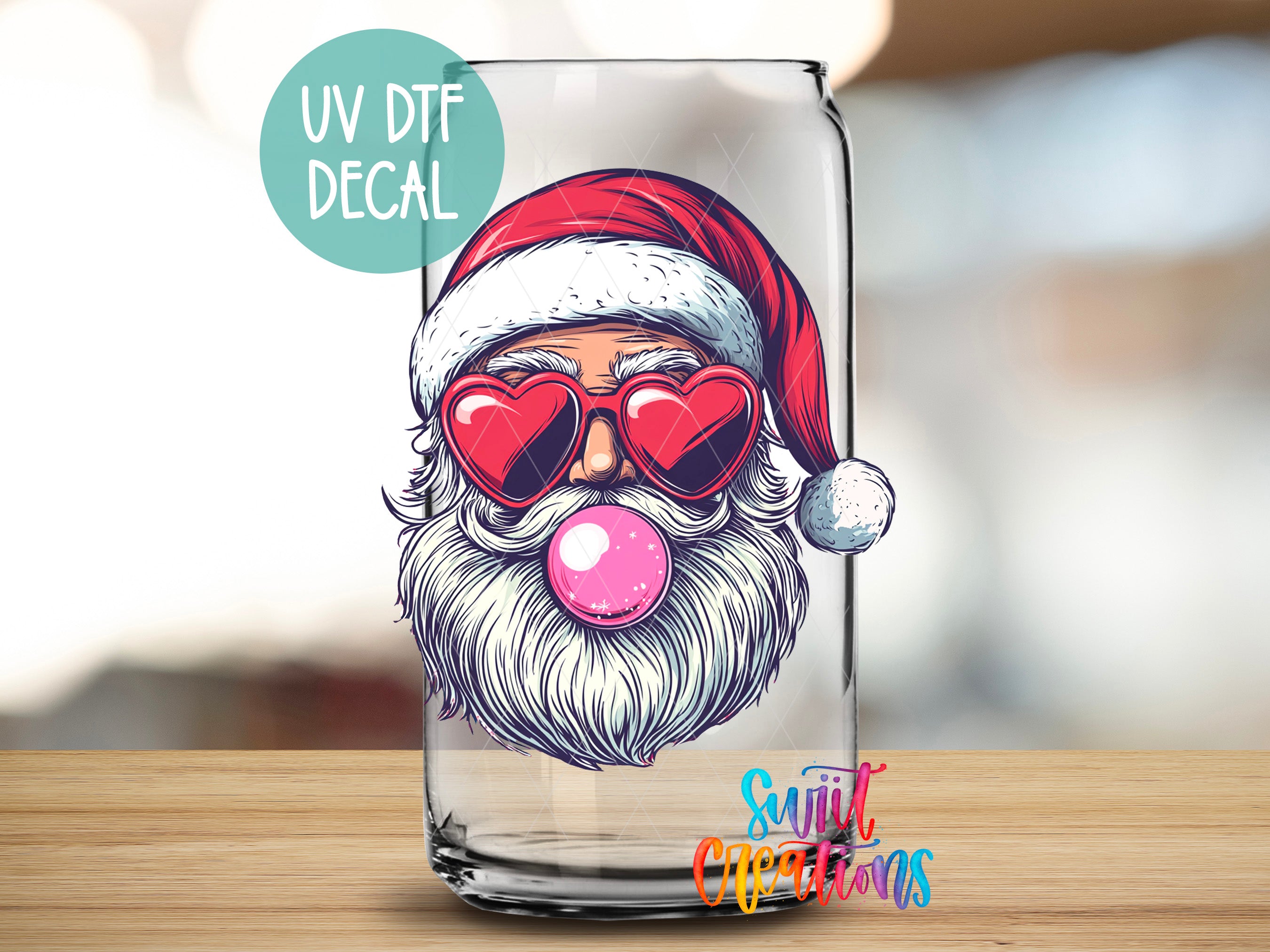 a glass with a picture of santa claus wearing sunglasses and a santa hat