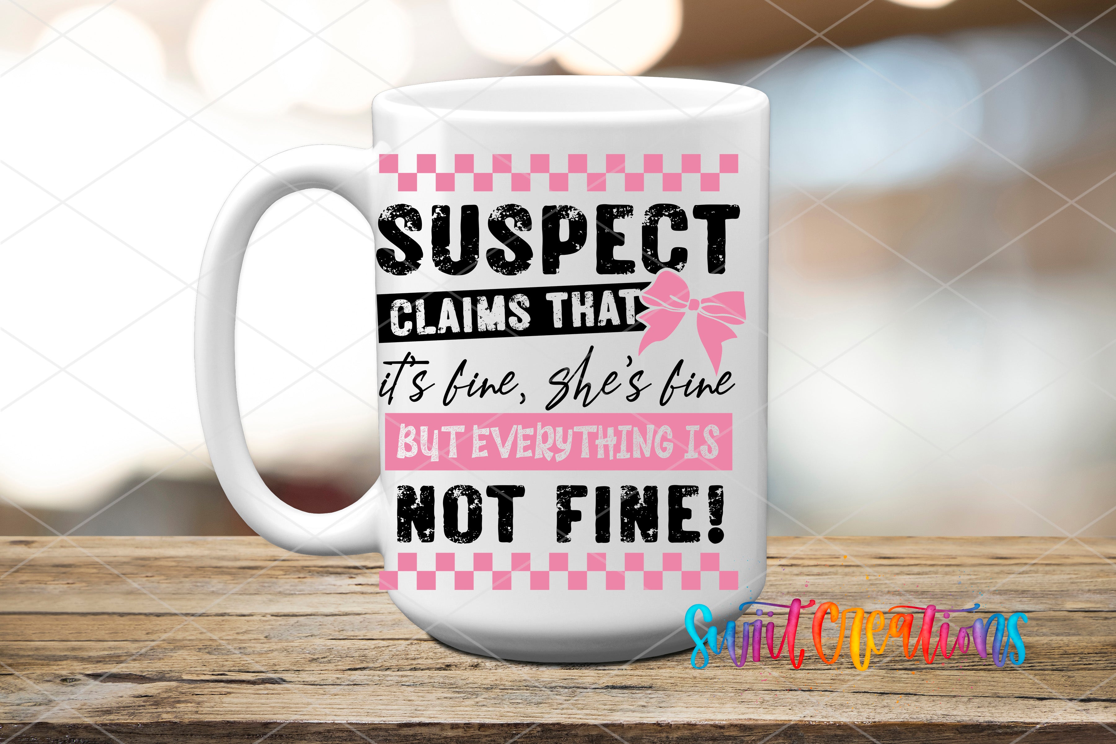 A white mug with a pink and black design featuring text that reads "SUSPECT CLAIMS THAT IT'S FINE, SHE'S FINE BUT EVERYTHING IS NOT FINE!"
