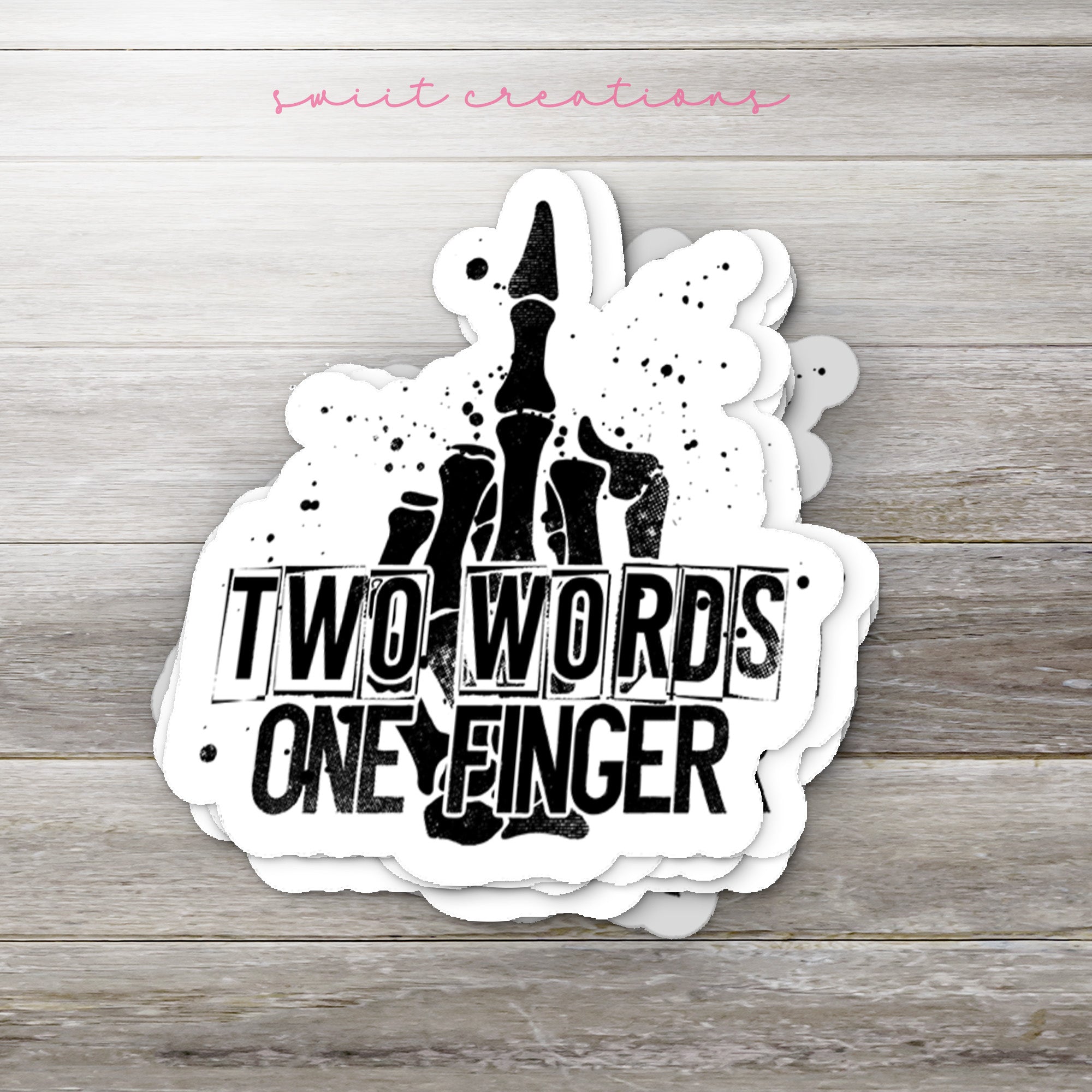 a sticker that says two words one finger