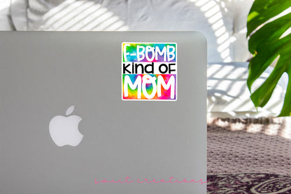 a laptop with a sticker that says bomb kind of mom