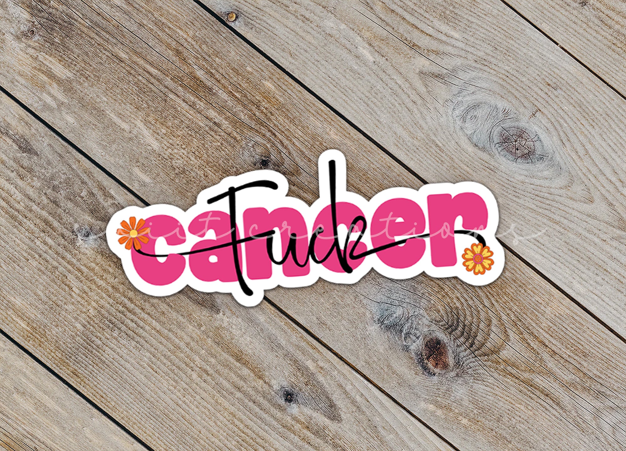 a sticker with the word candin on it