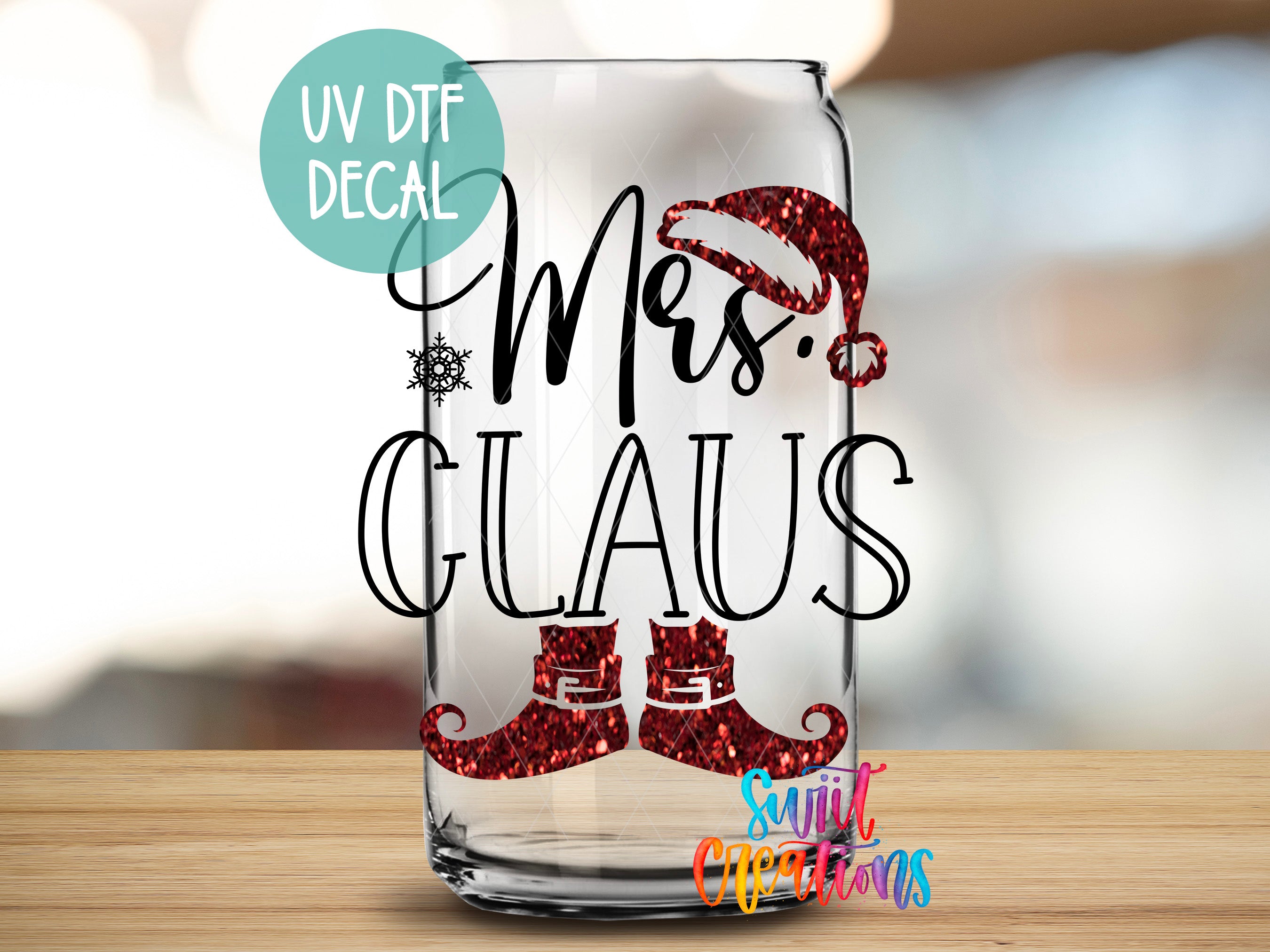 a glass with the words mrs claus on it
