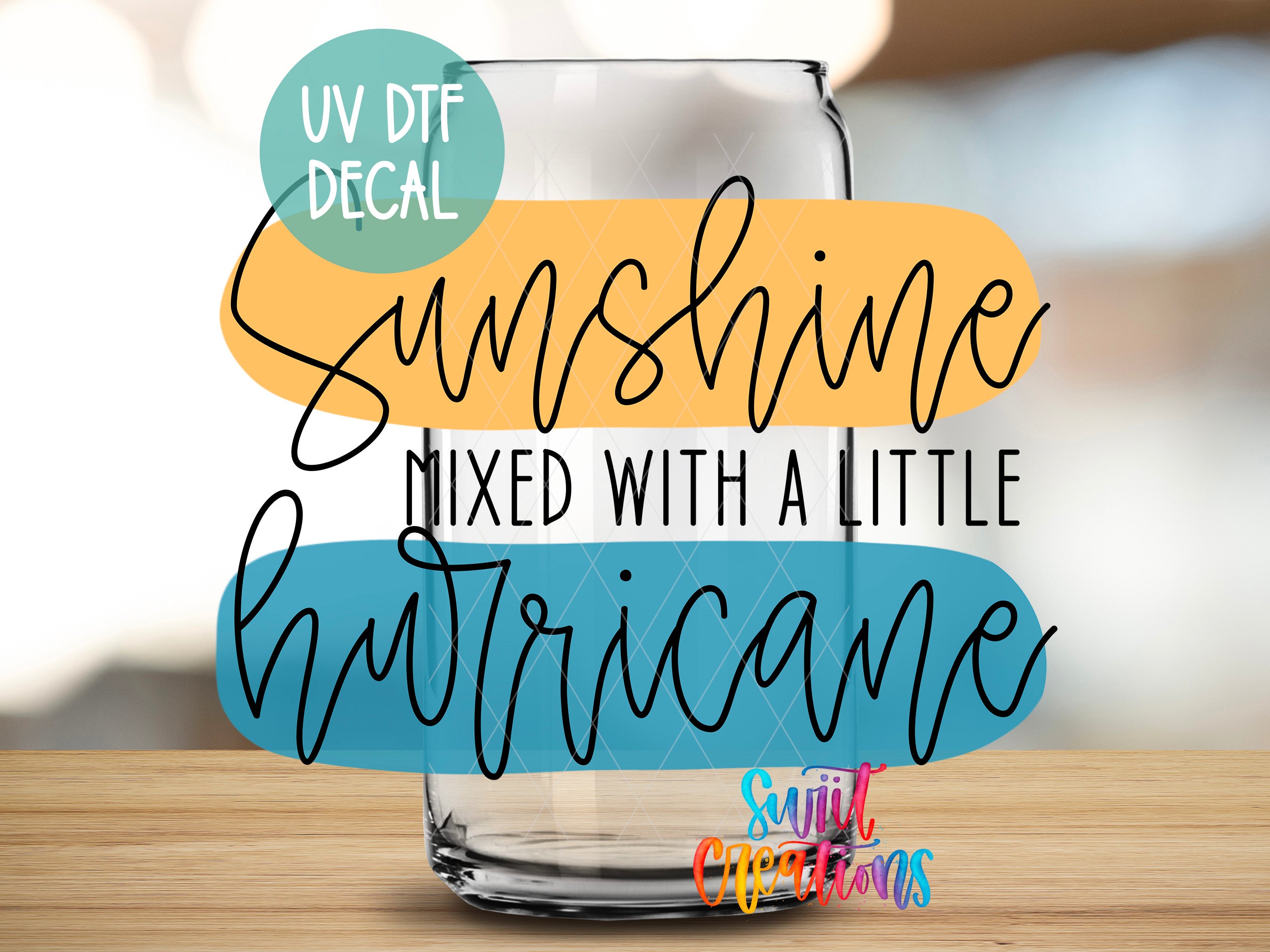 a glass with a UV decal that says "Sunshine Mixed with a Little Hurricane".