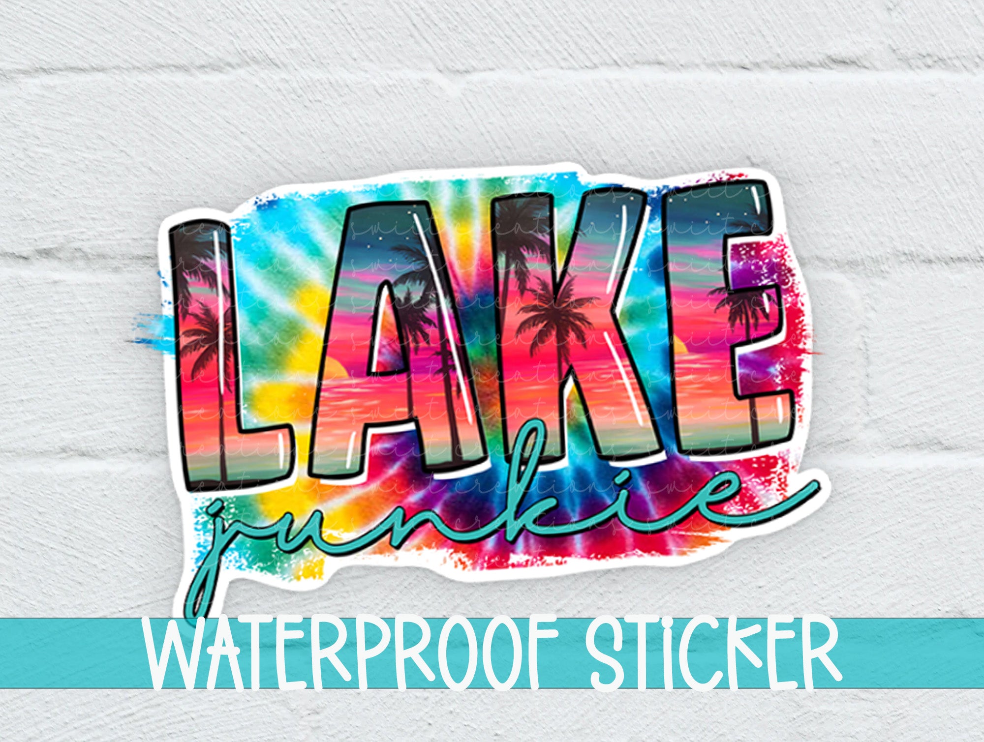 a sticker that says lake paradise on a white brick wall