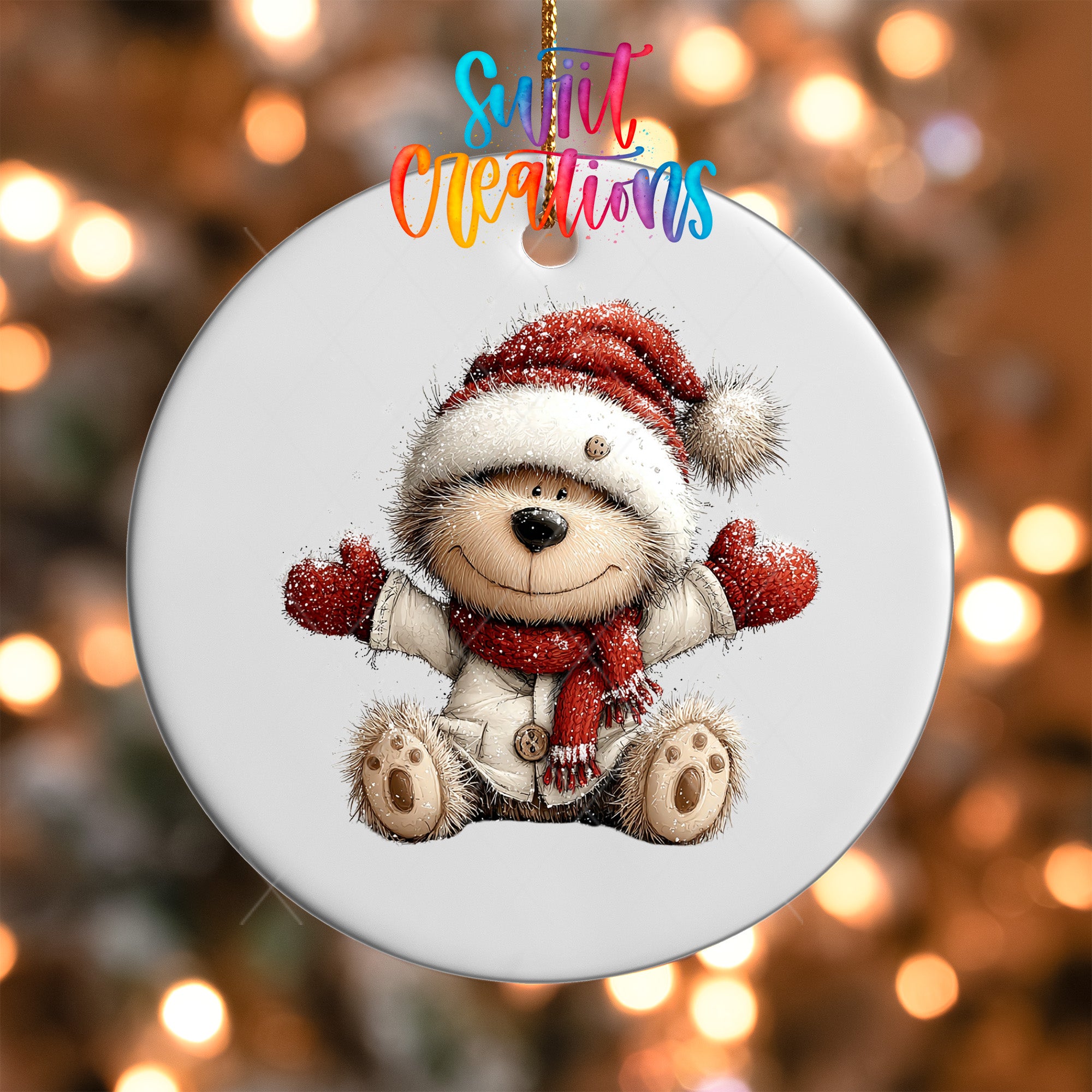 A white ornament featuring a smiling teddy bear wearing a Santa hat and scarf, with a colorful background.