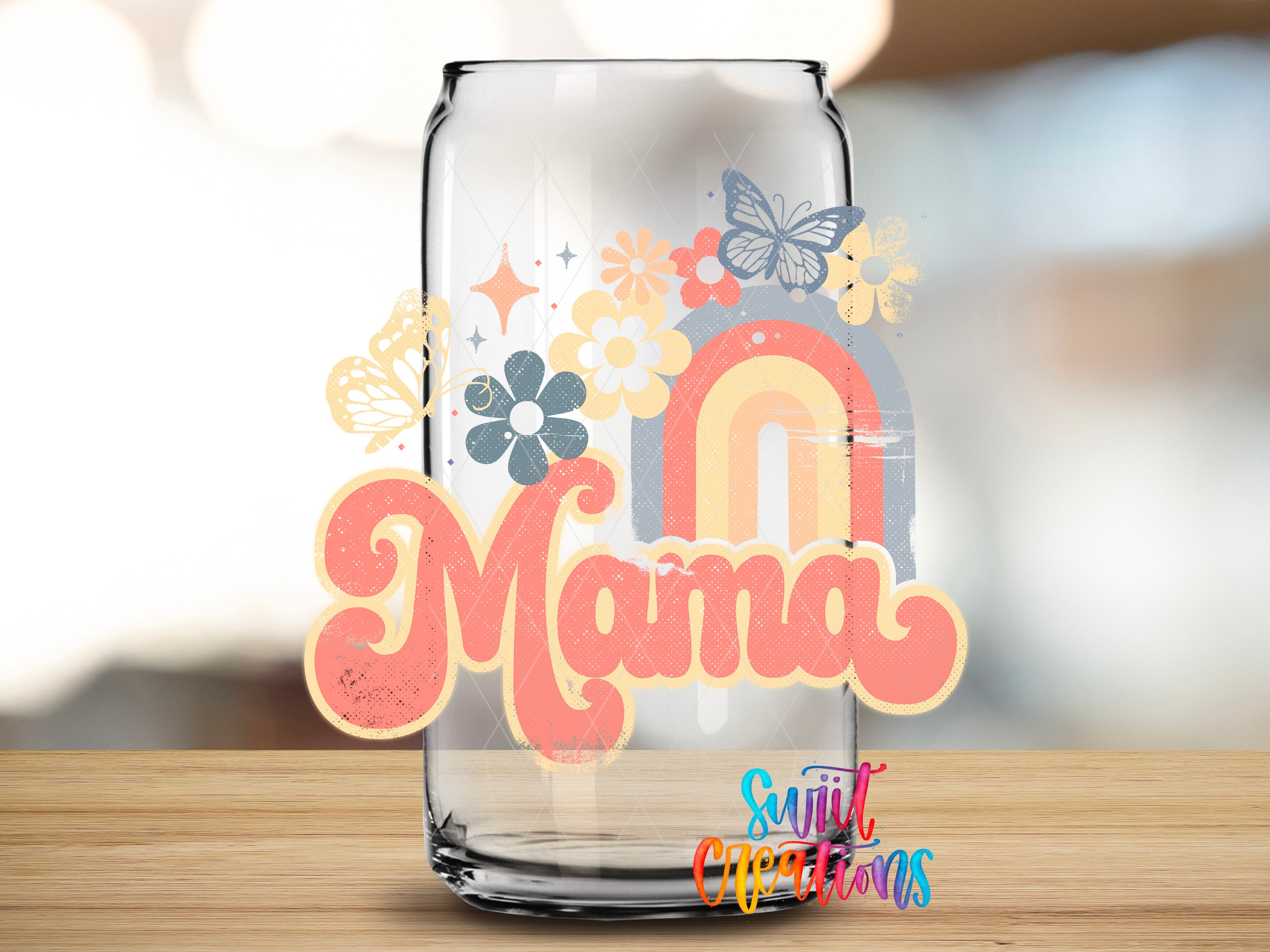 A glass jar with a colorful, retro-style design featuring the word "Mama" and various floral and butterfly motifs.