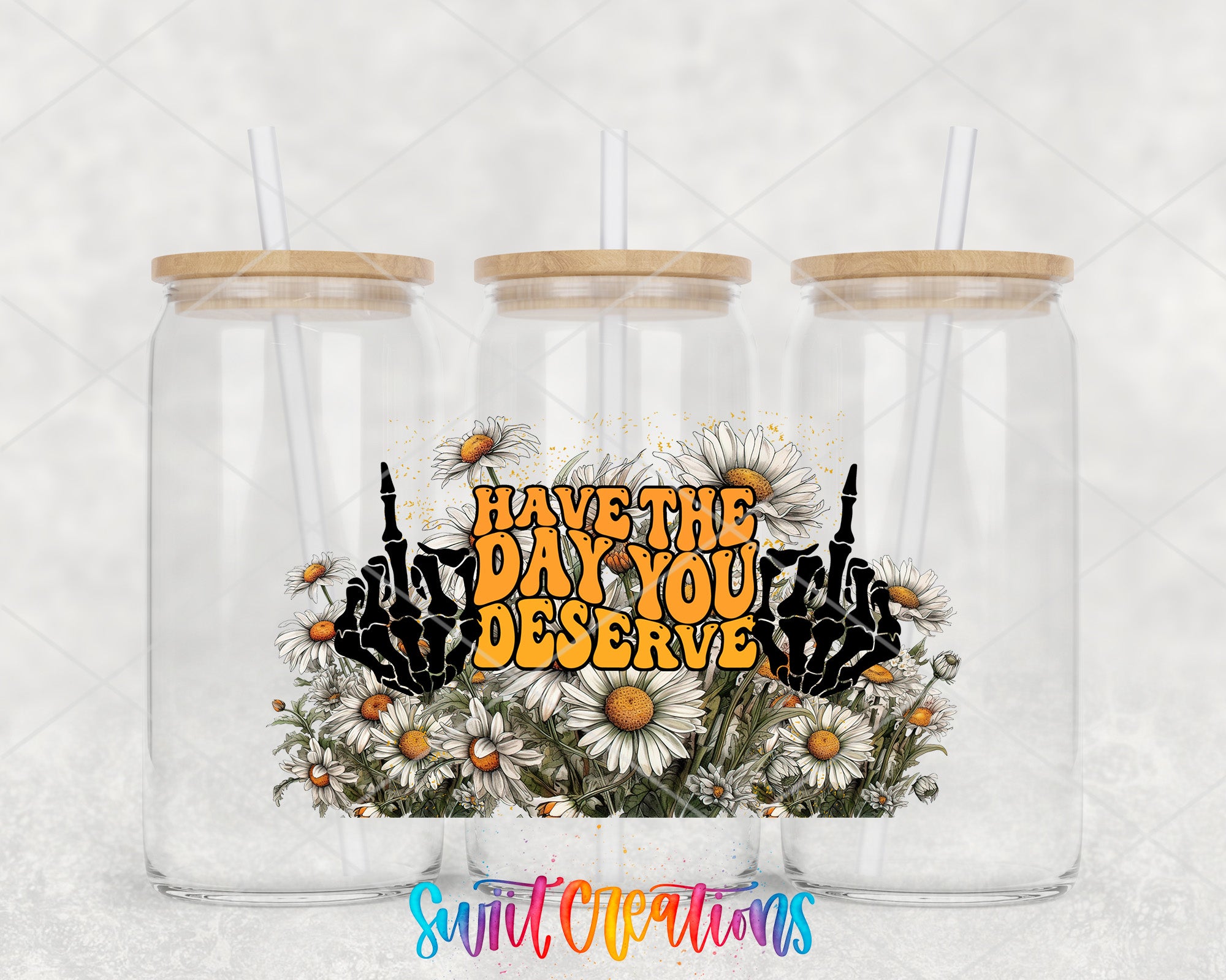 three glass jars with wooden lids, each containing a straw. The jars are filled with flowers, and there is a hand gesture on the front of the jars. The text "HAVE THE DAY YOU DESERVE" is displayed on the front of the jars, along with a colorful, artistic design.