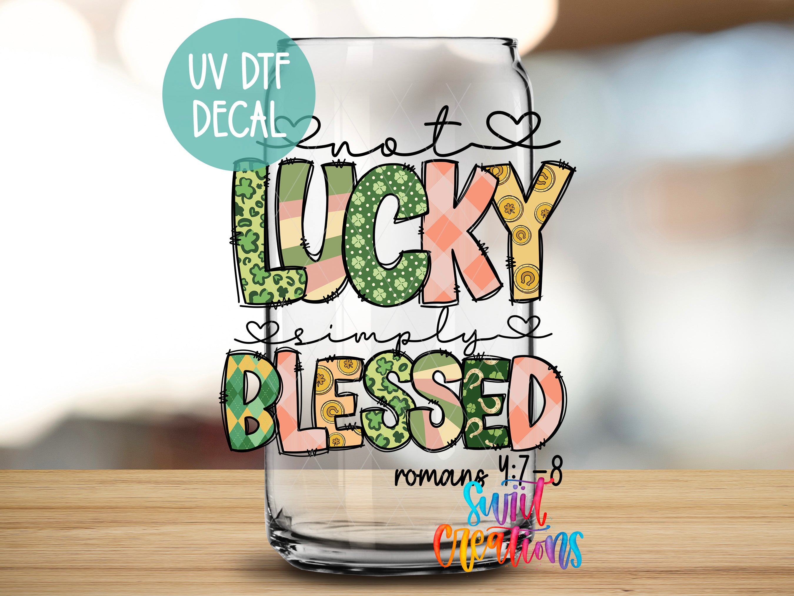 a glass with a message on it sitting on a table