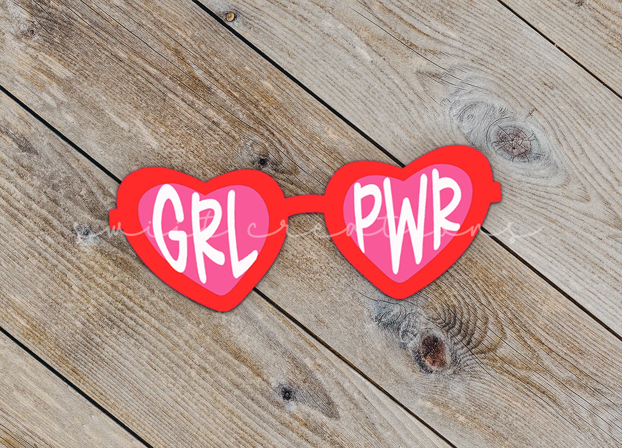 a pair of heart shaped sunglasses with the word grl pwr written on them