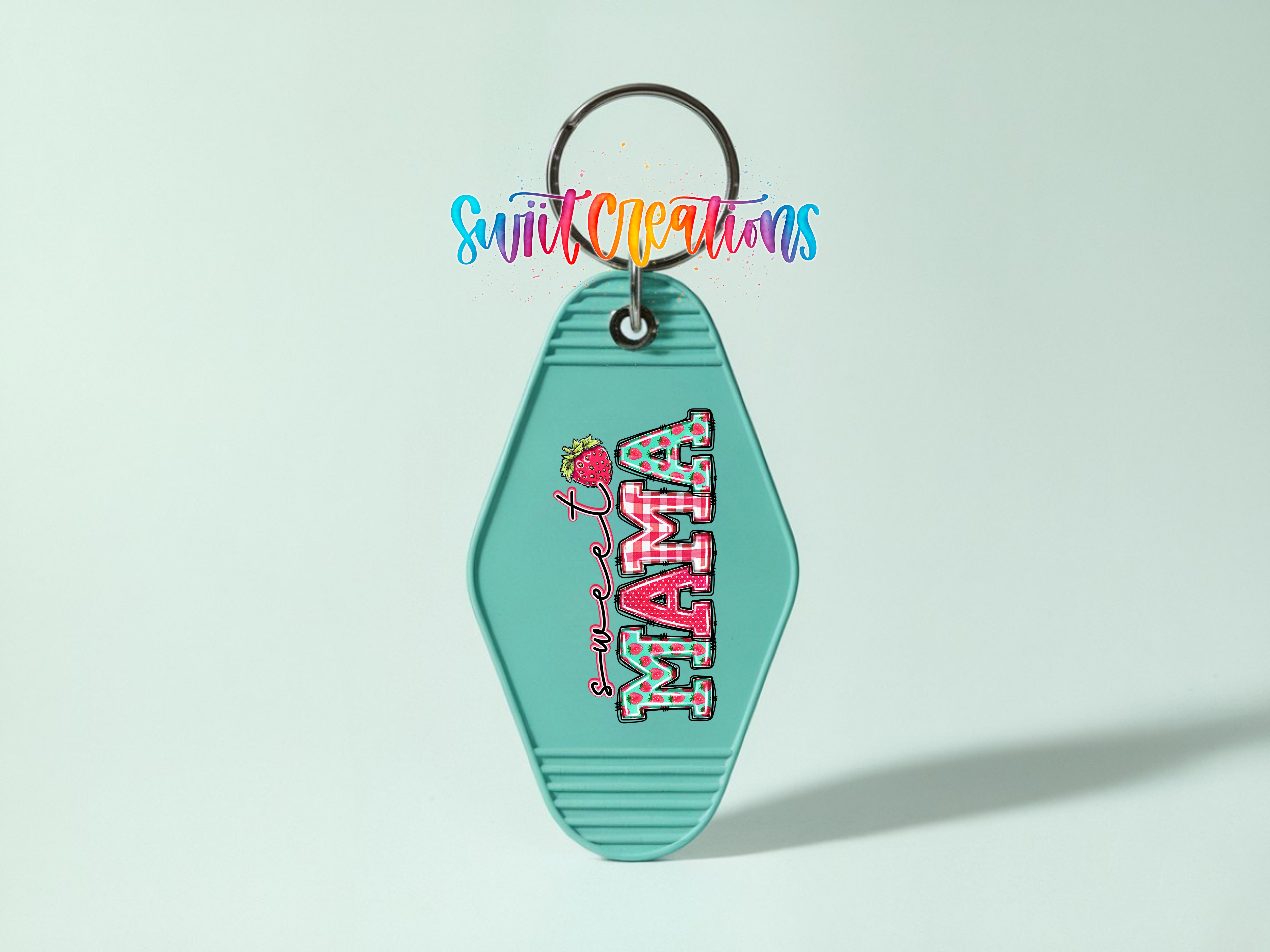 A keychain with the word "MAMA" written on it, along with a colorful design.