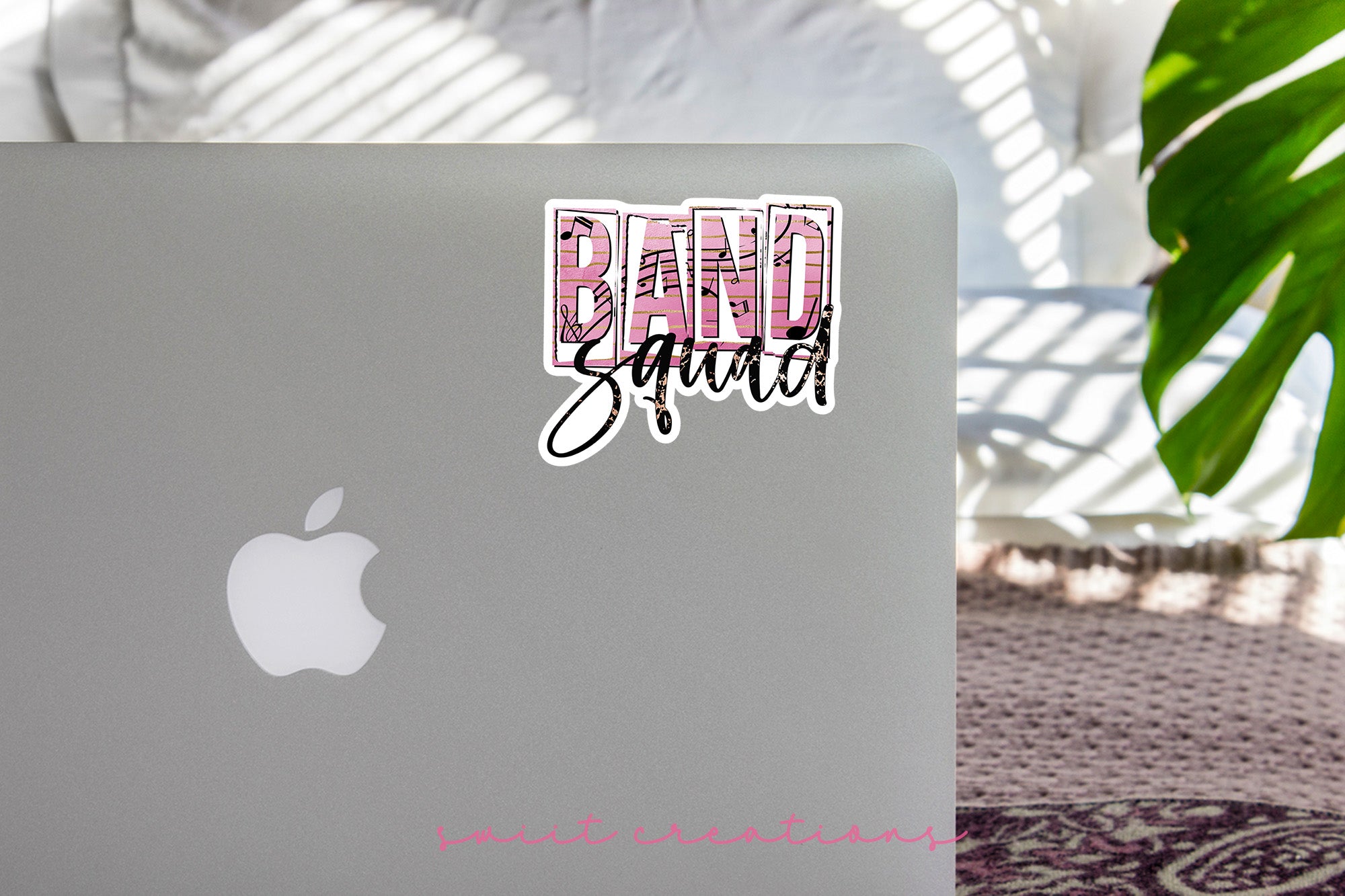 a laptop computer sitting on top of a table