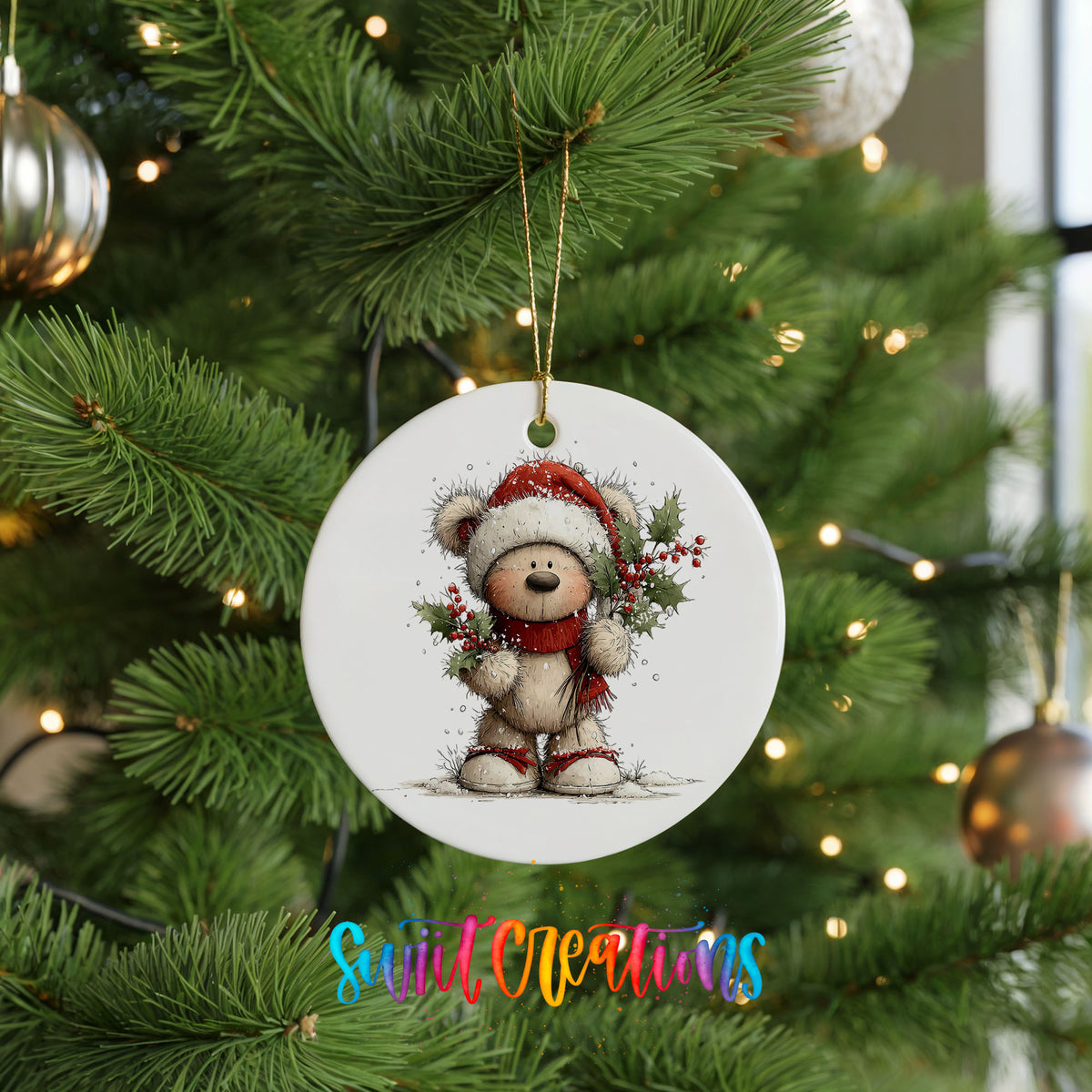 teddy bear framed by a Christmas wreath ceramic Christmas ornament hanging on a lit Christmas tree