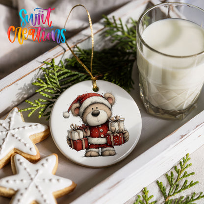 teddy bear dressed as Santa carrying Christmas gifts ceramic Christmas ornament styled with holiday cookies and a candle