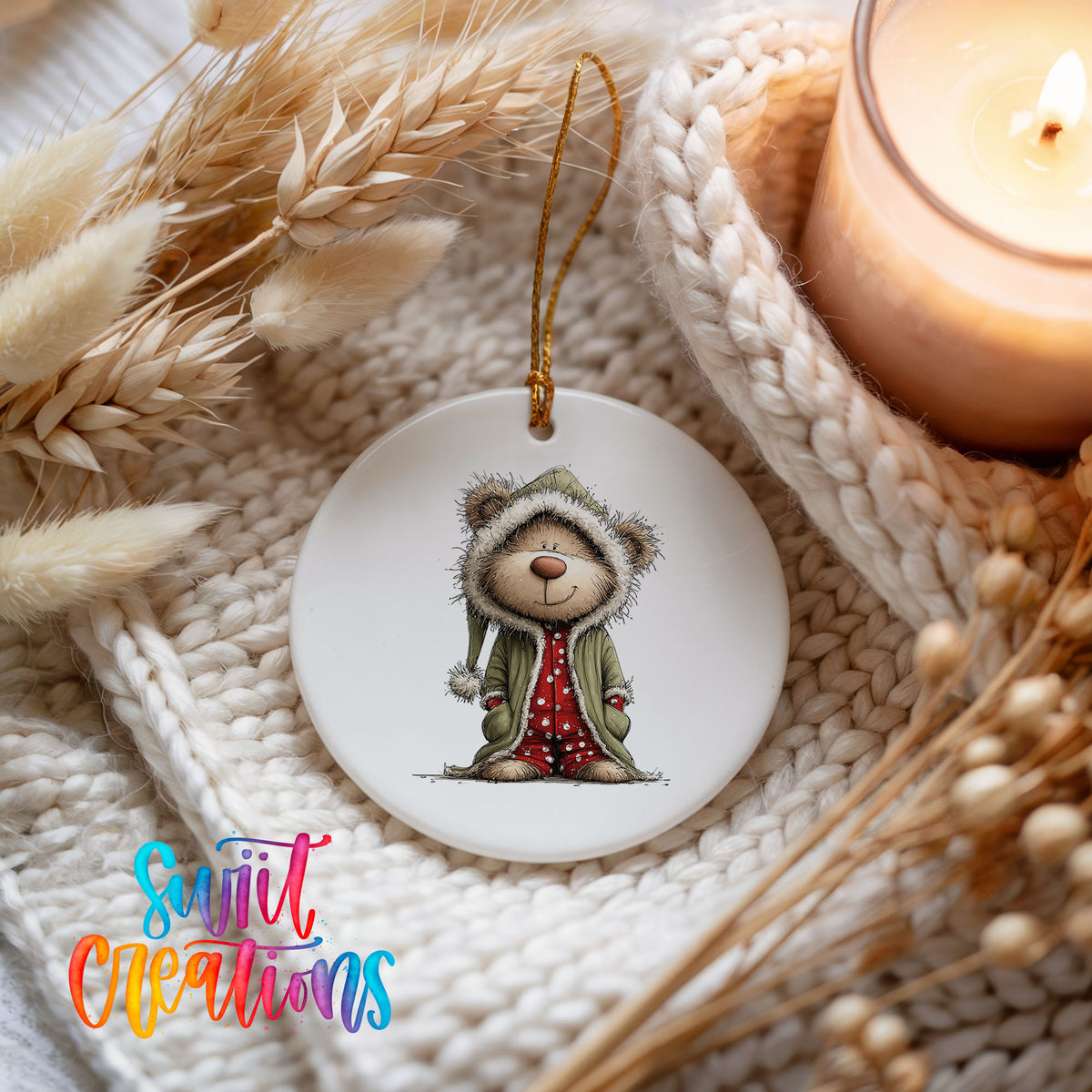 teddy bear in a gray hooded winter coat ceramic Christmas ornament styled on a cozy knit blanket