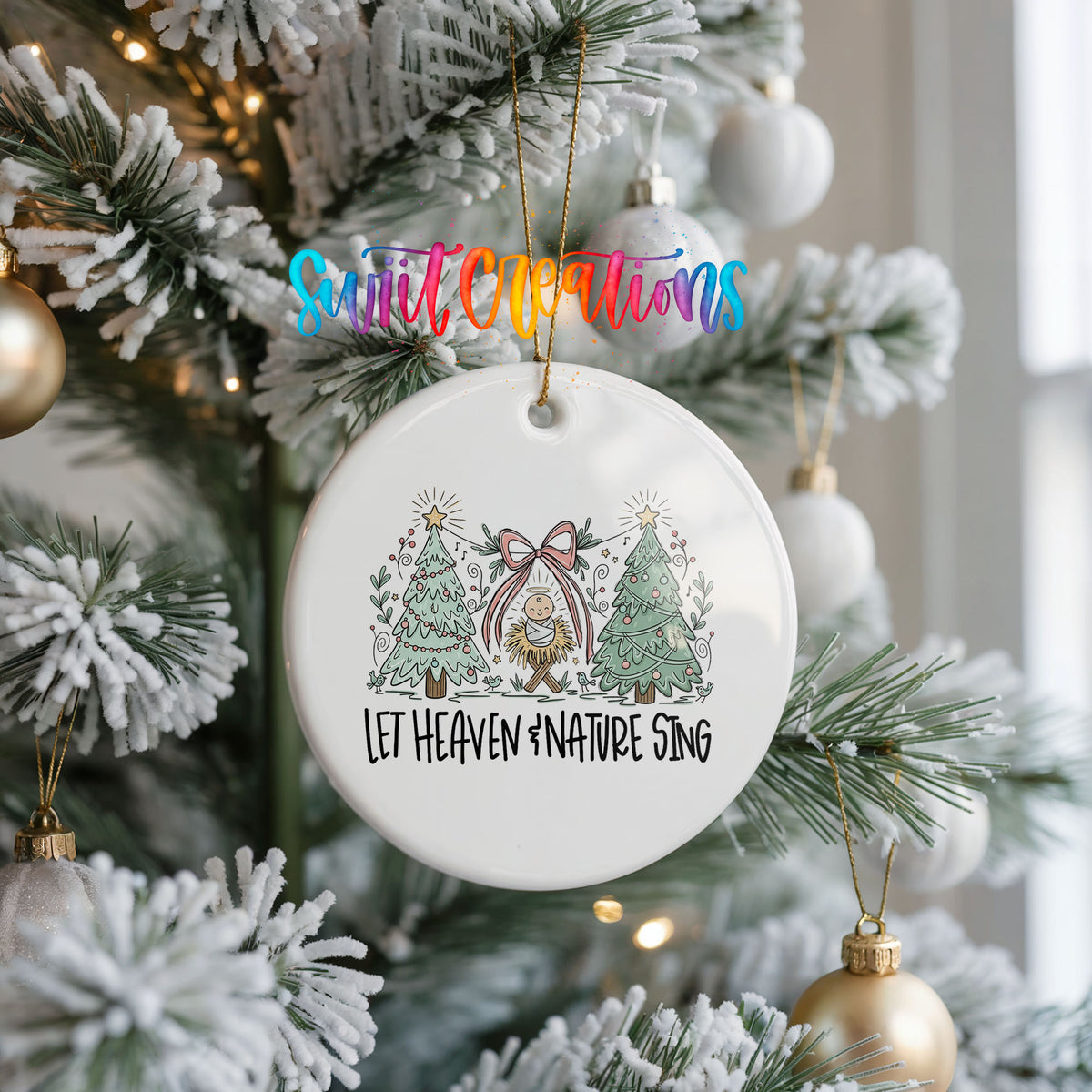 Let Heaven and Nature Sing church and winter trees design ceramic Christmas ornament hanging on a frosted Christmas tree