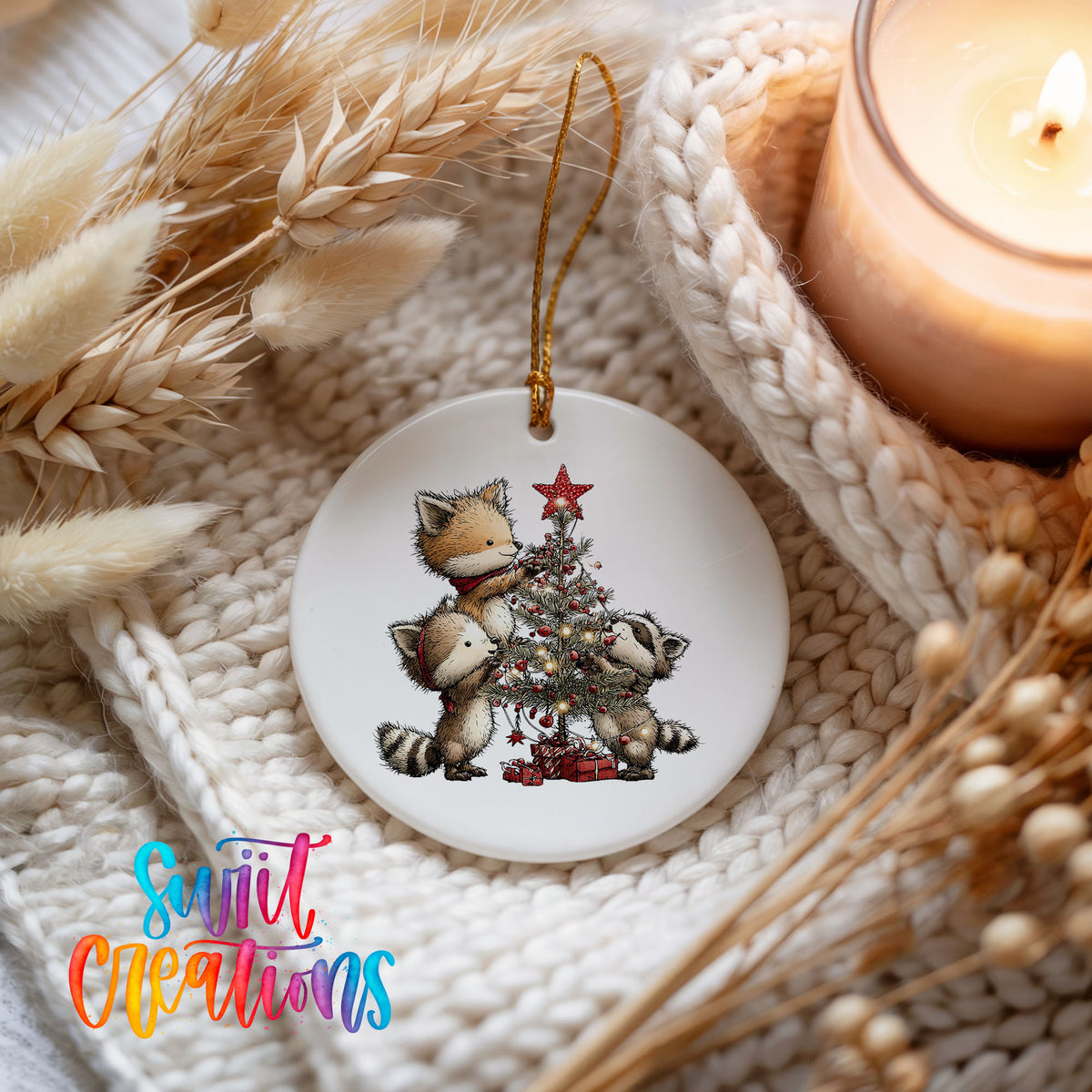 woodland fox beside a decorated Christmas tree ceramic Christmas ornament styled on a cozy knit blanket