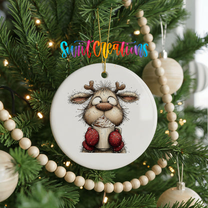 woodland reindeer wearing red mittens ceramic Christmas ornament hanging on a green Christmas tree