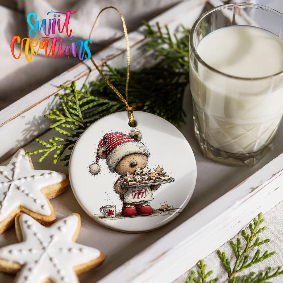 woodland bear in a Santa hat carrying Christmas cookies ceramic Christmas ornament styled with holiday cookies and a candle